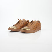Gold & Beyond MCM Cognac Terrain low-top sneakers with stylish design and textured sole, casual shoes for everyday wear.