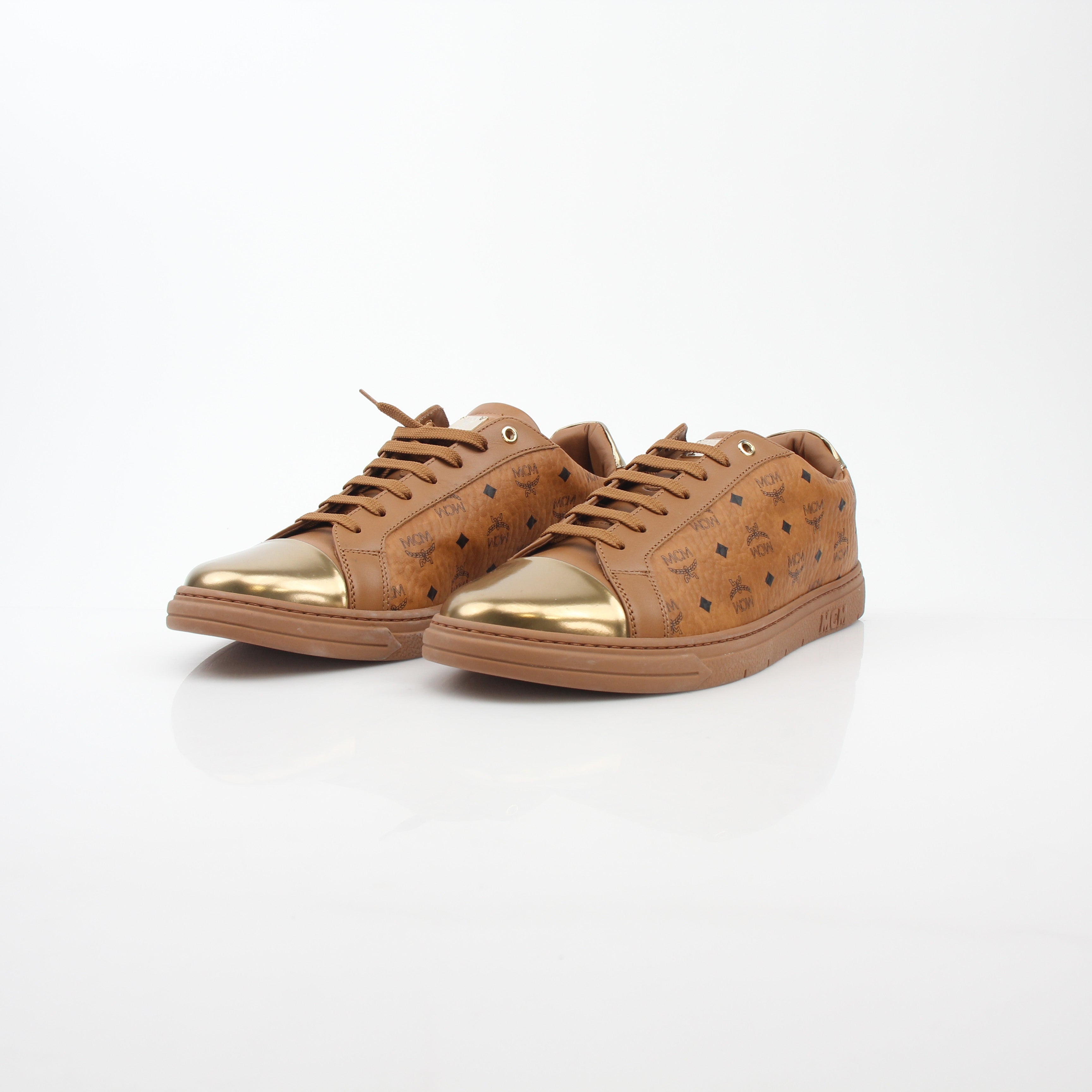 Gold & Beyond MCM Cognac Terrain low-top sneakers with stylish design and textured sole, casual shoes for everyday wear.