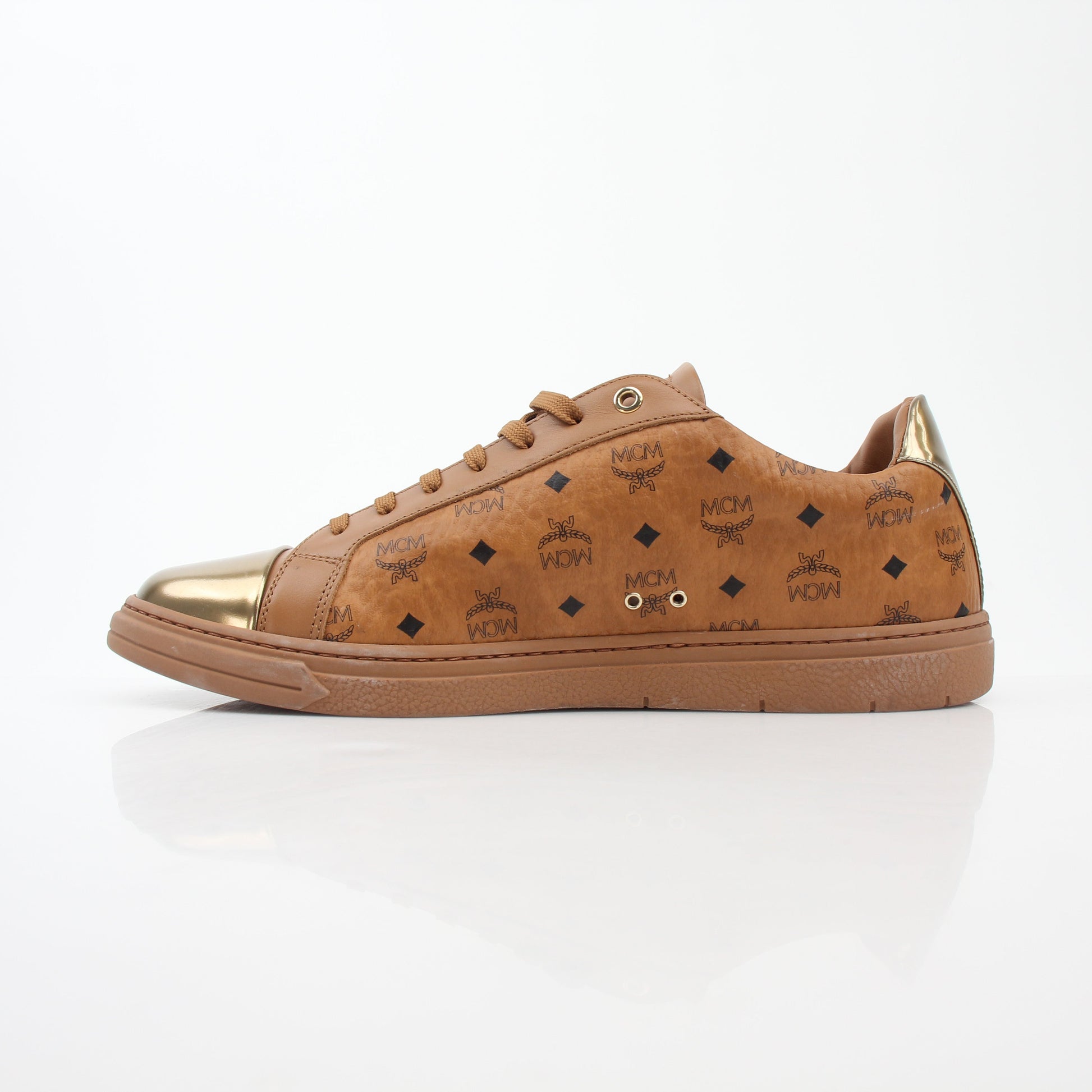 Gold & Beyond MCM Cognac Terrain low-top sneakers with textured suede and rubber soles, casual shoes for everyday wear.