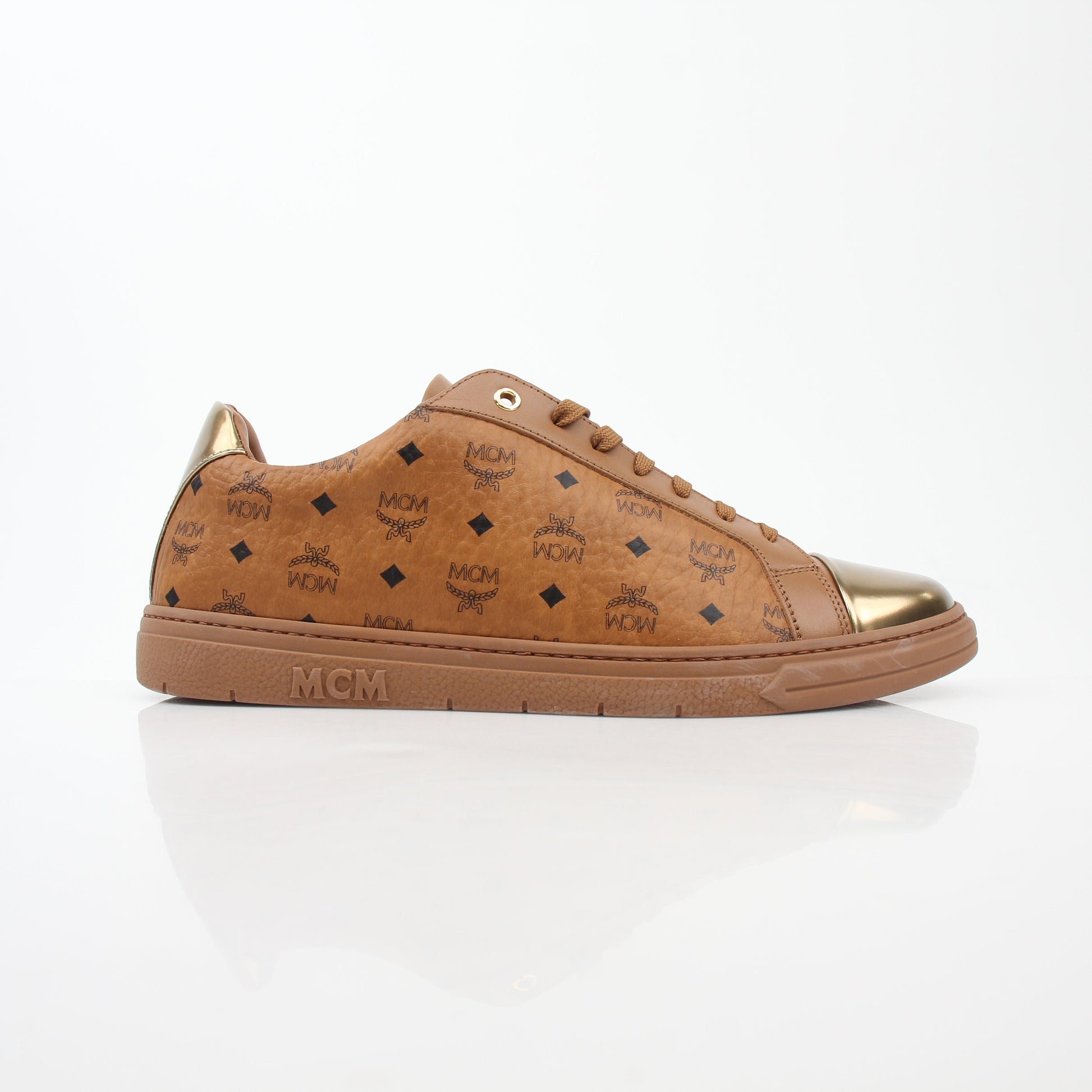 Gold & Beyond MCM Cognac Terrain low-top sneakers with leather and suede details, stylish casual shoes for everyday wear.