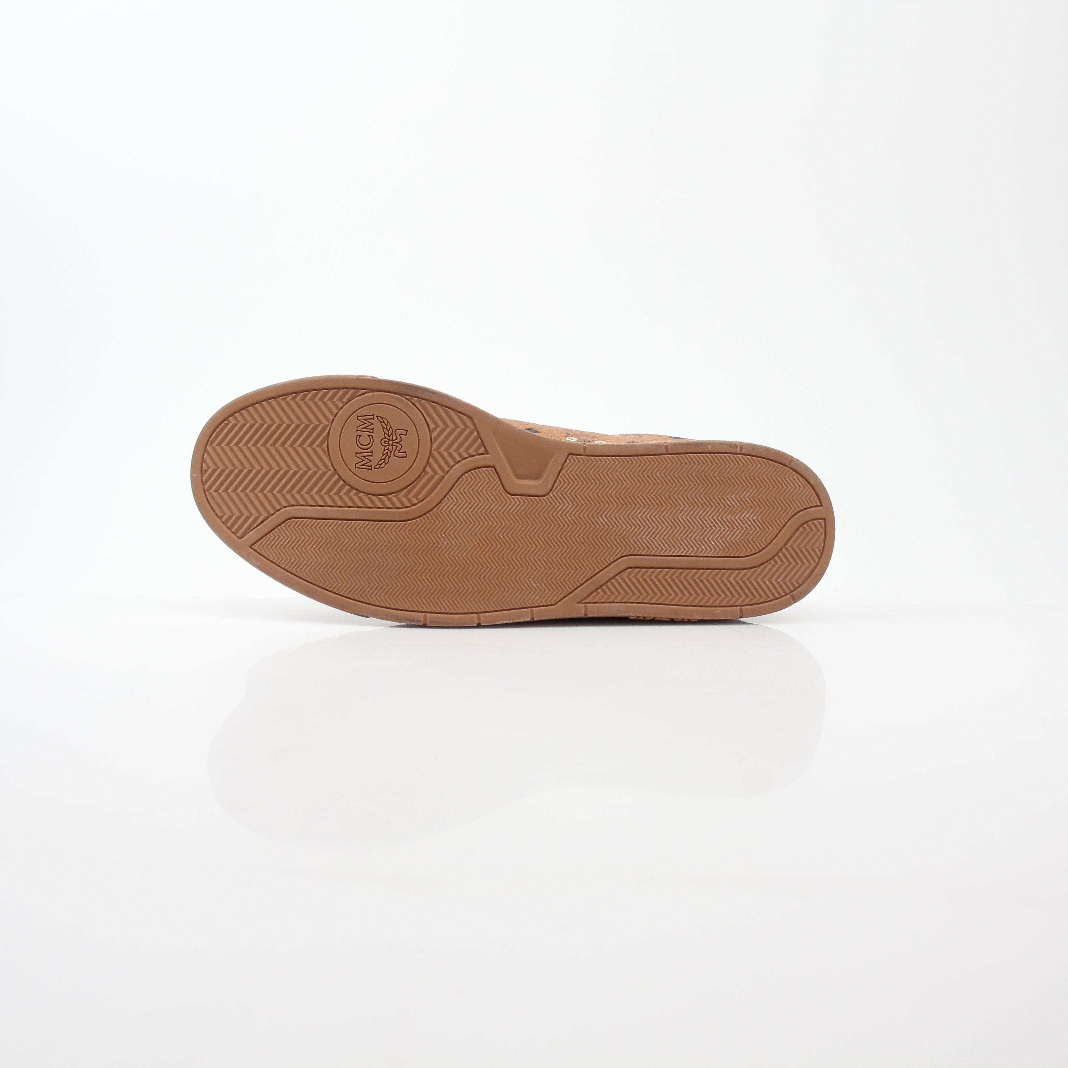 Gold & Beyond MCM Cognac Terrain low-top sneakers with stylish design and comfortable fit, shown on a plain background.