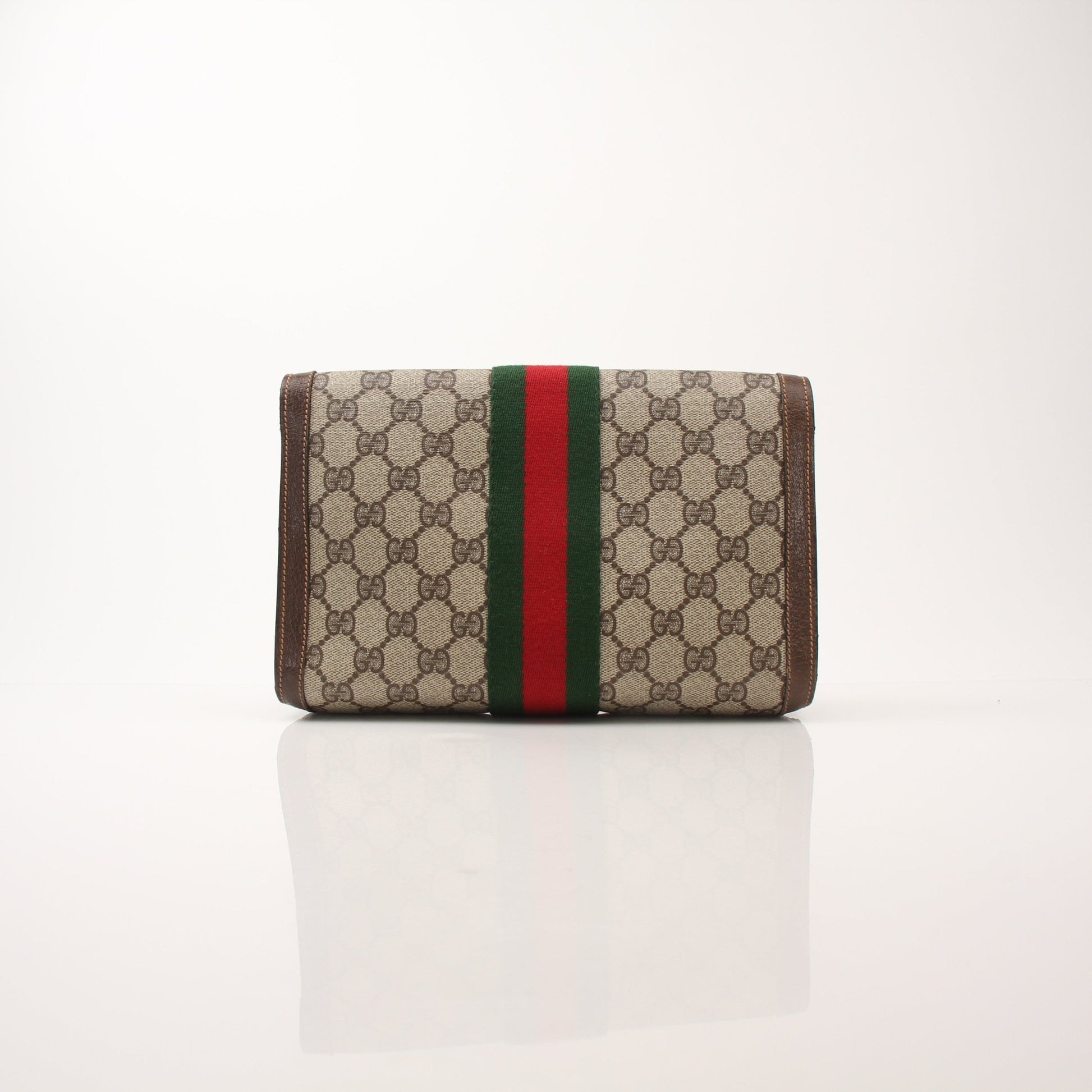 Gucci Vintage Clutch Bag by Gold & Beyond, elegant handbag with classic design and luxurious details, displayed on a neutral background.