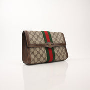 Gucci Vintage Clutch Bag by Gold & Beyond, elegant handbag with classic design, featuring textured leather and gold accents.