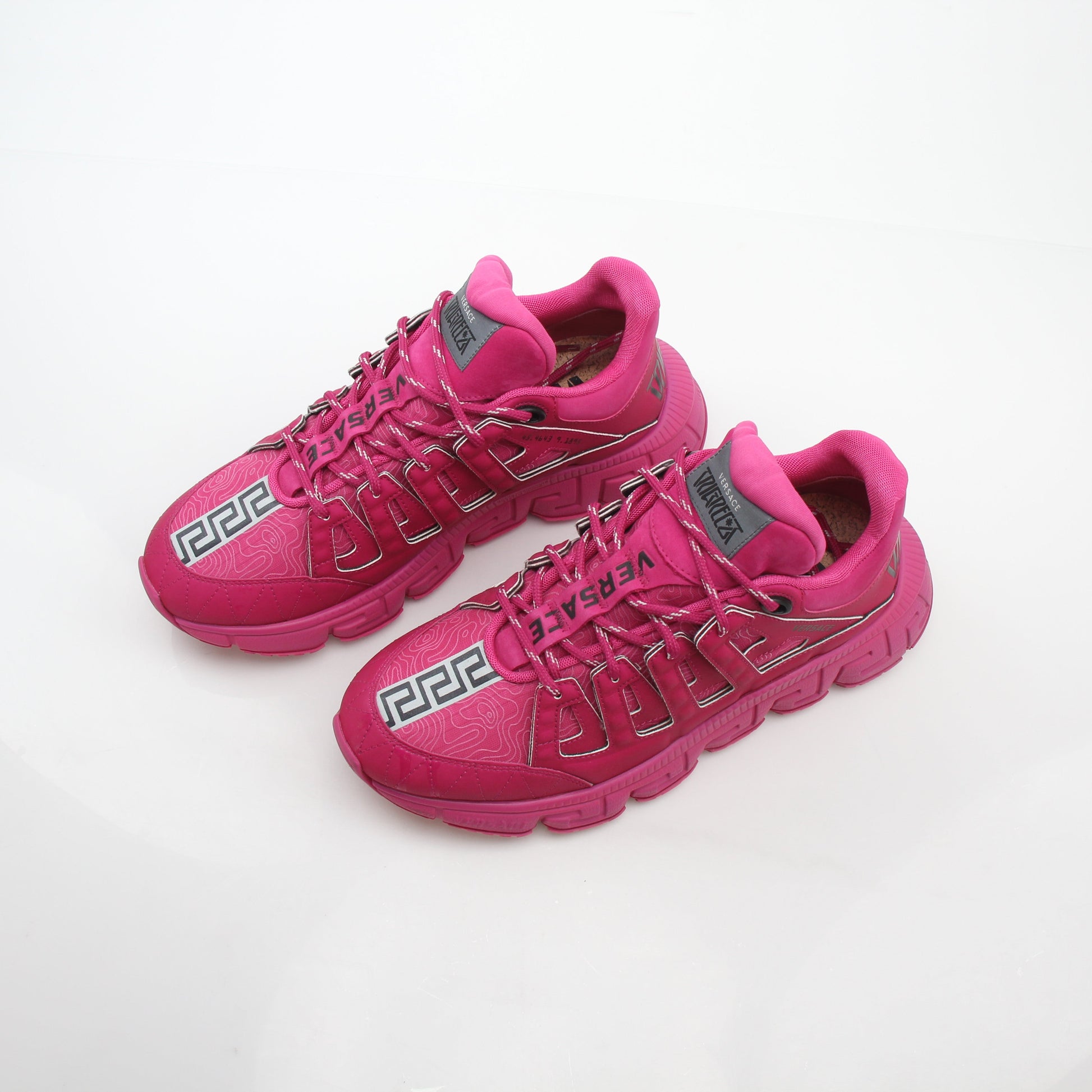 Gold & Beyond Versace Pink Trigreca low-top sneakers with stylish design and comfortable fit, shown on a clean white background.
