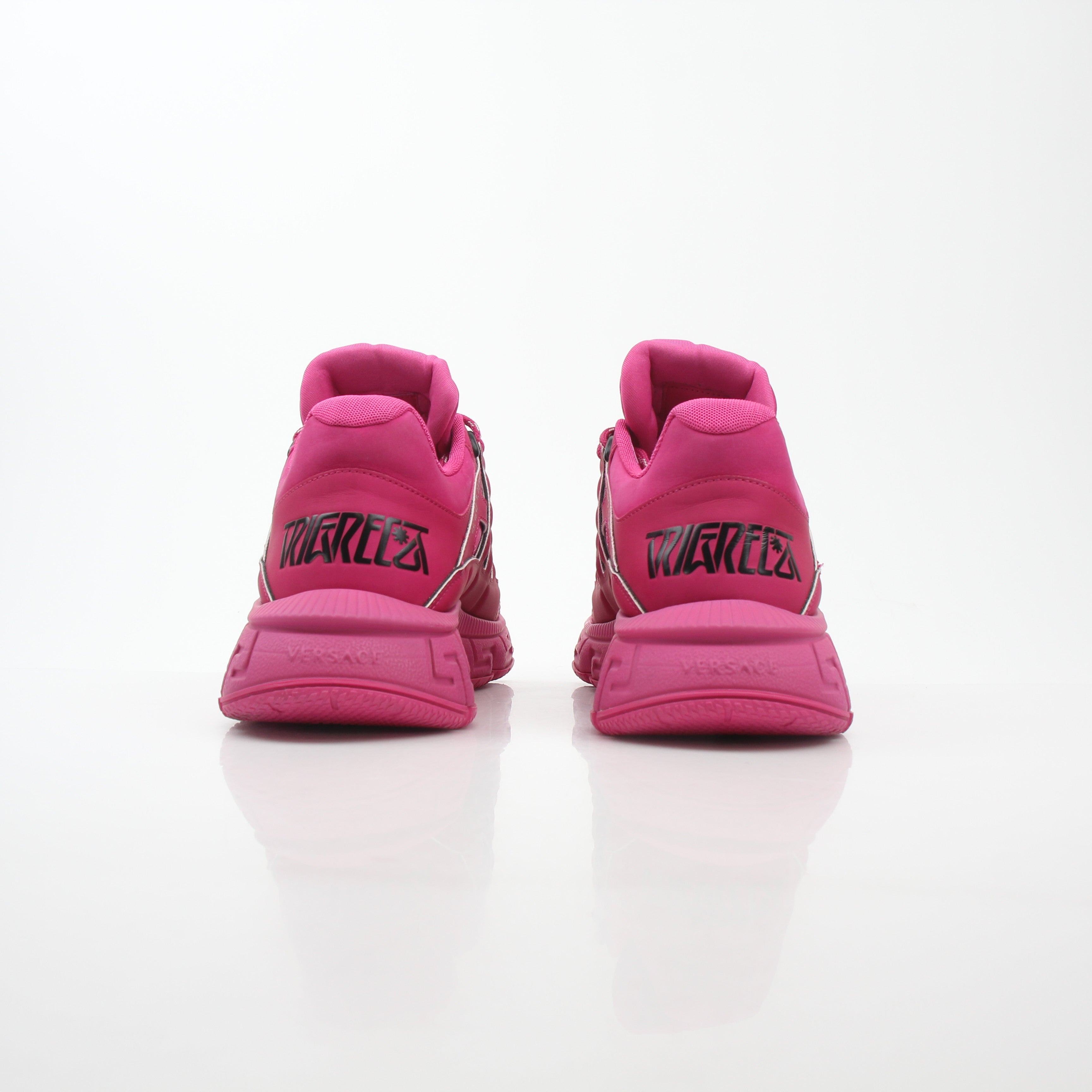 Gold & Beyond Versace Pink Trigreca low-top sneakers with stylish design and white rubber soles.