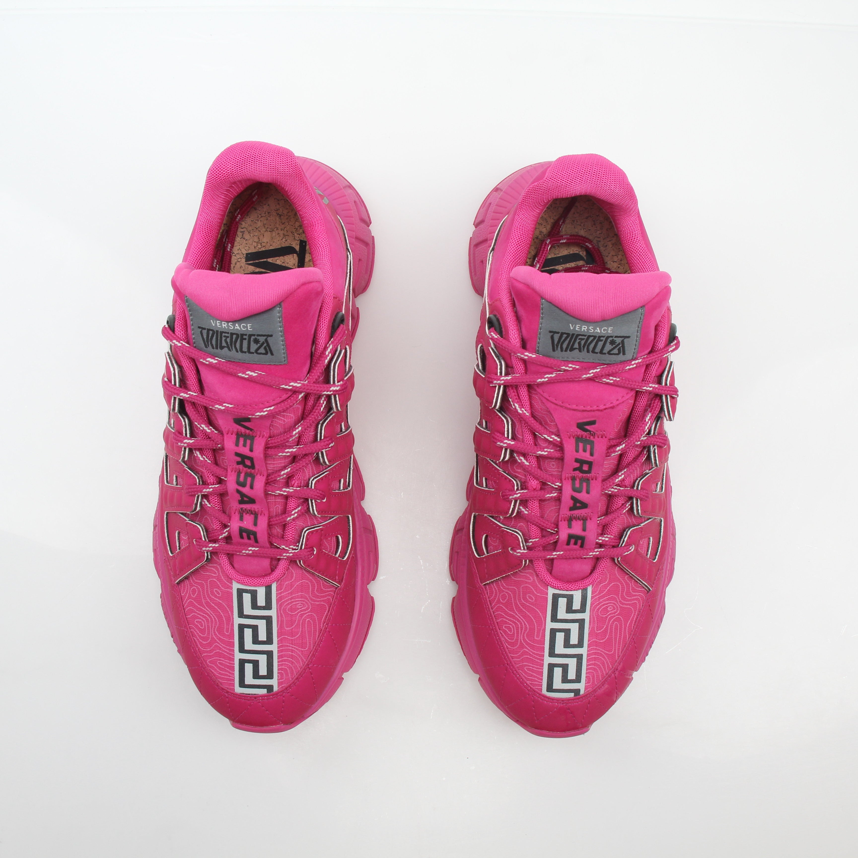 Gold & Beyond Versace Pink Trigreca low-top sneakers with stylish design, featuring pink color and sneaker details.