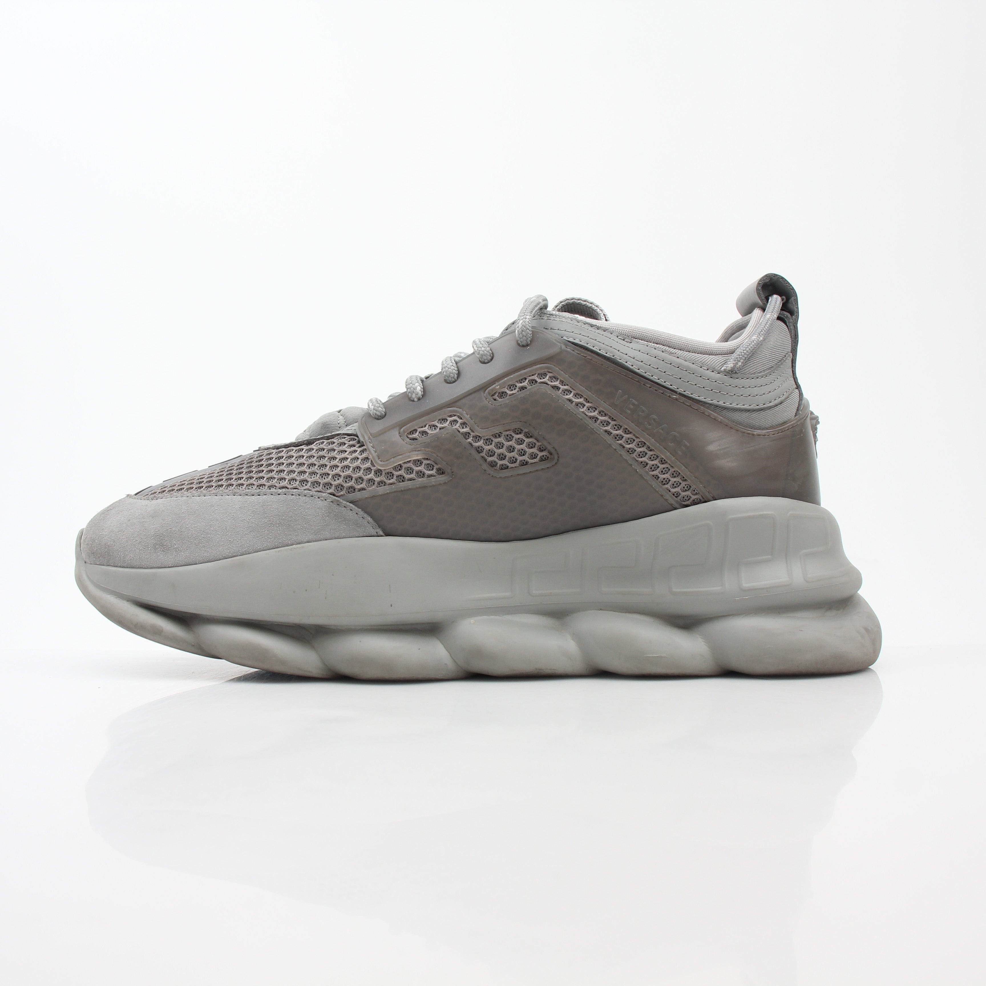 Versace Gray Chain Reaction Sneakers by Gold & Beyond, stylish shoes with a gray color and chain design, on a white background.