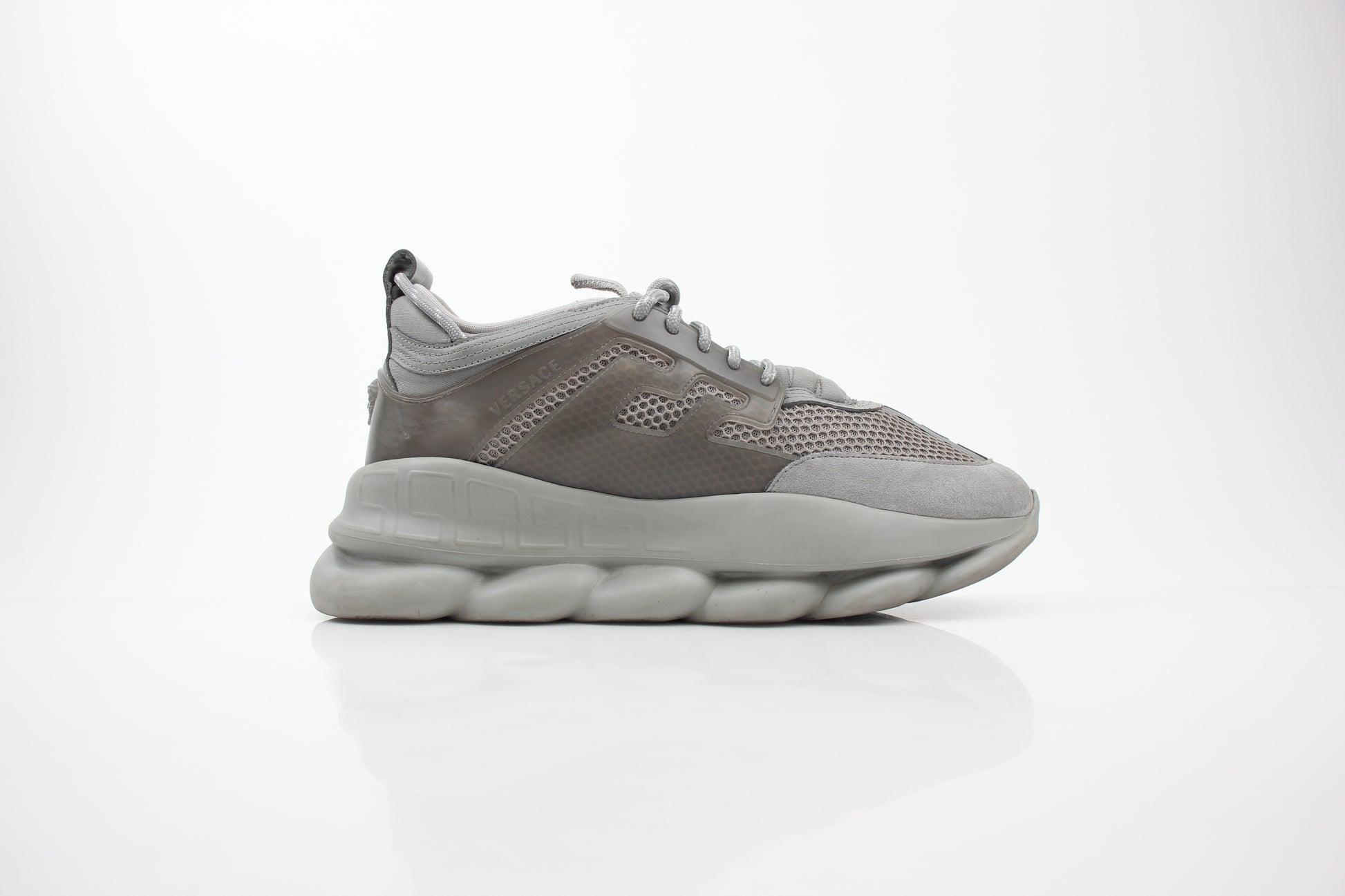 Versace Gray Chain Reaction sneakers for men, featuring stylish design and comfortable fit from Gold & Beyond.