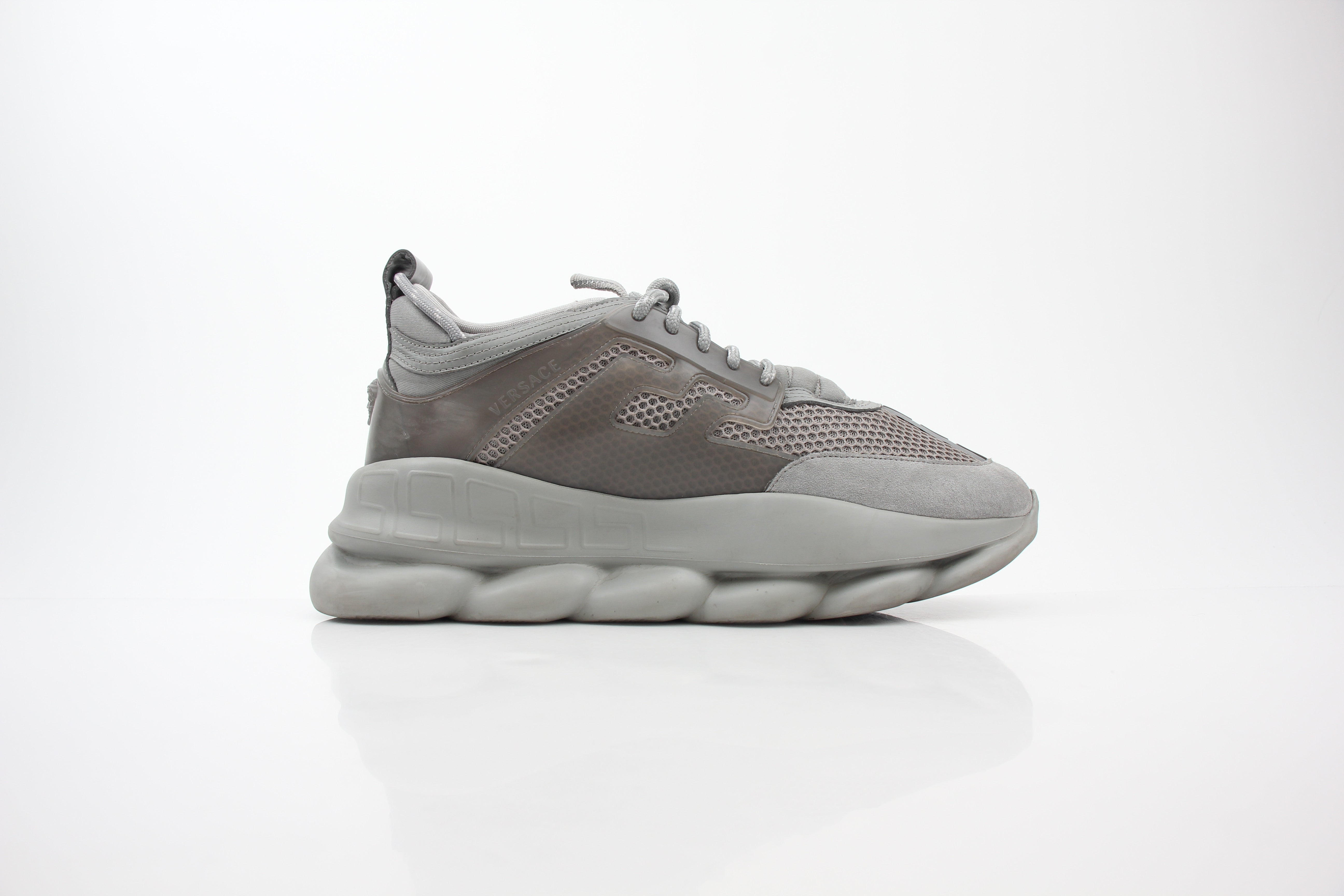 Versace Gray Chain Reaction sneakers for men, featuring stylish design and comfortable fit from Gold & Beyond.