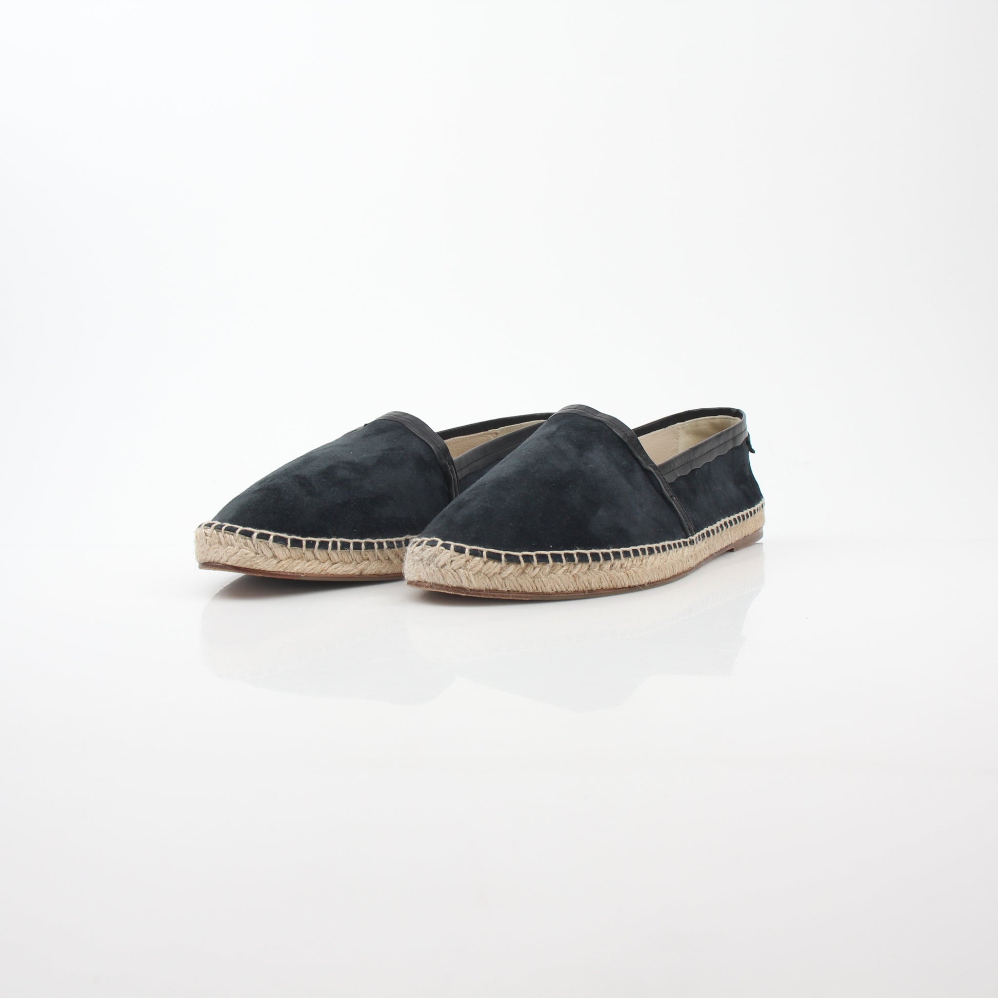 Black suede Dolce & Gabbana espadrille shoes with woven jute soles, showcased on a neutral background.