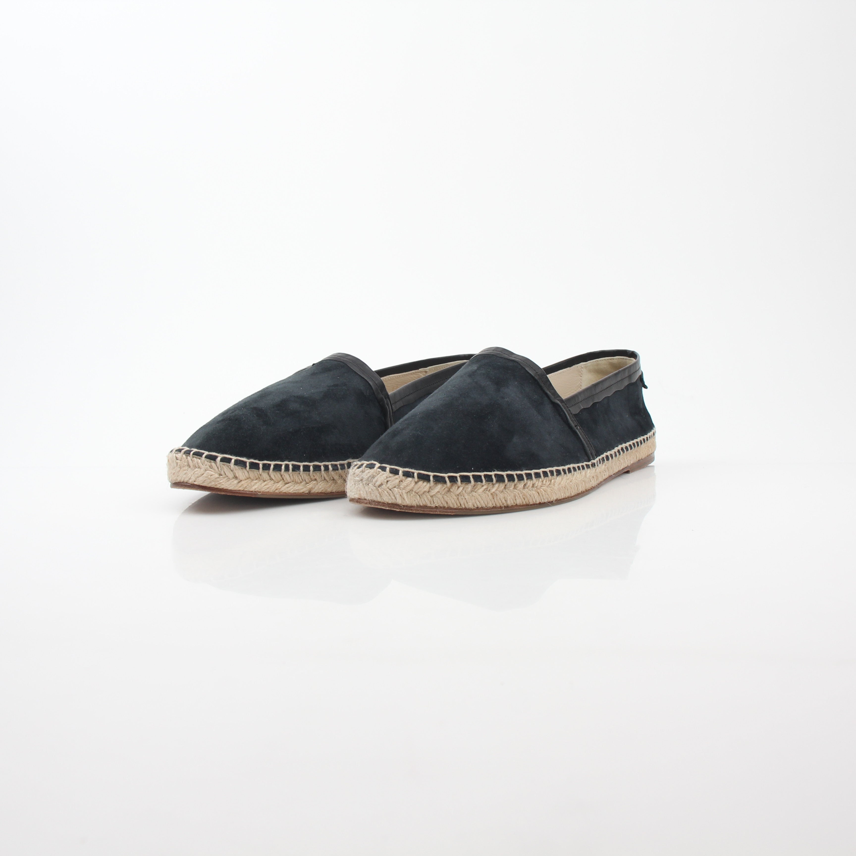 Black suede Dolce & Gabbana espadrille shoes with woven jute soles, showcased on a neutral background.