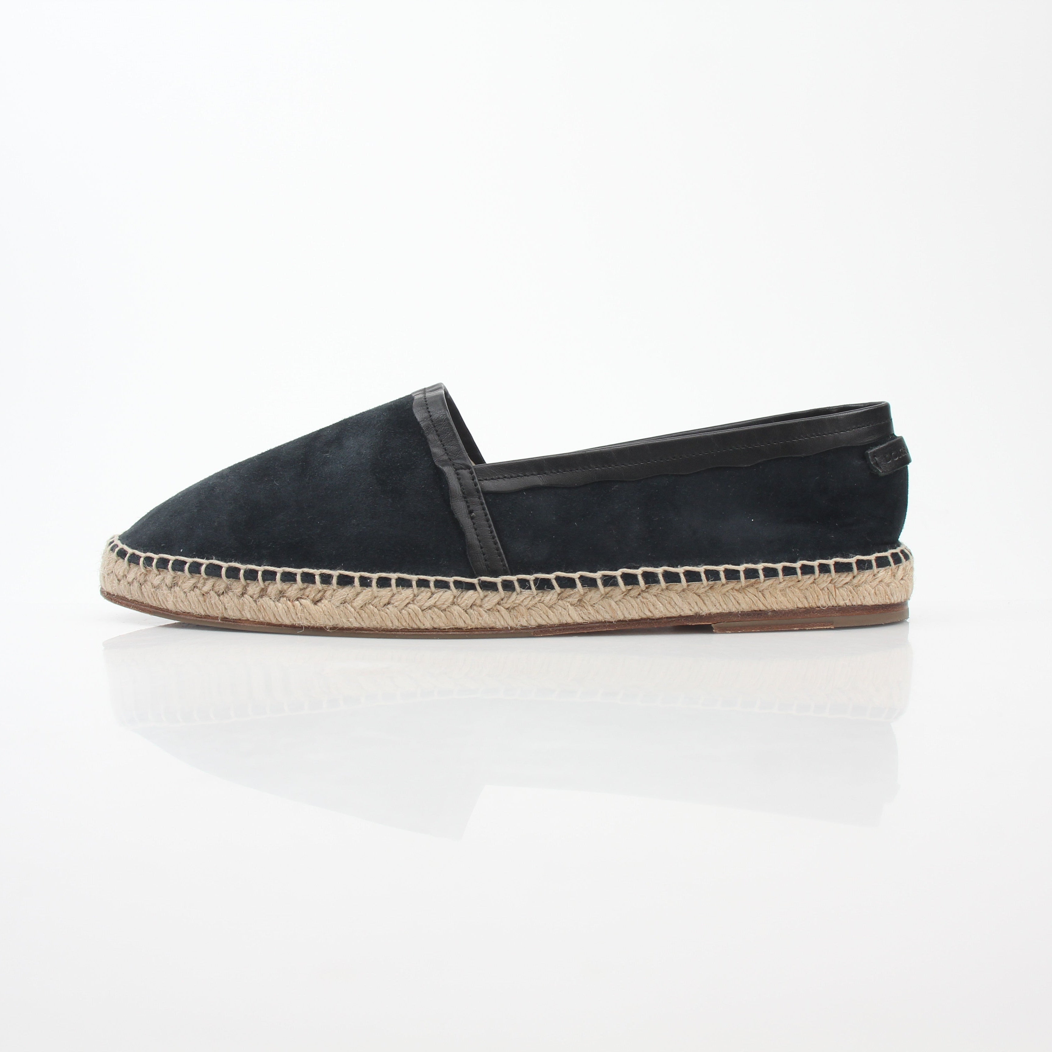Black suede Dolce & Gabbana espadrille shoes with a woven jute sole and slip-on style, displayed on a neutral background.