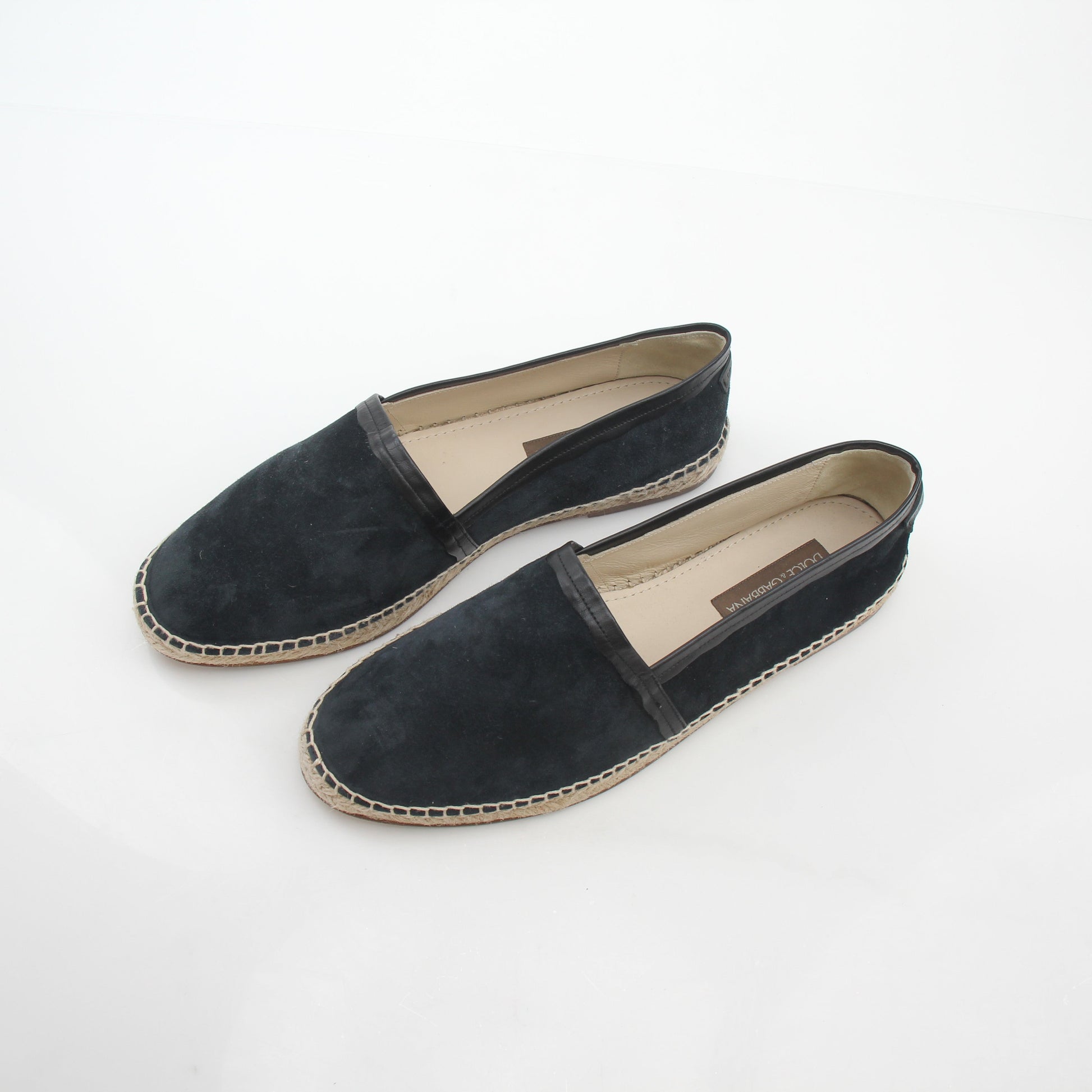 Black suede Dolce & Gabbana espadrille shoes with woven jute soles, featuring a sleek and stylish design.