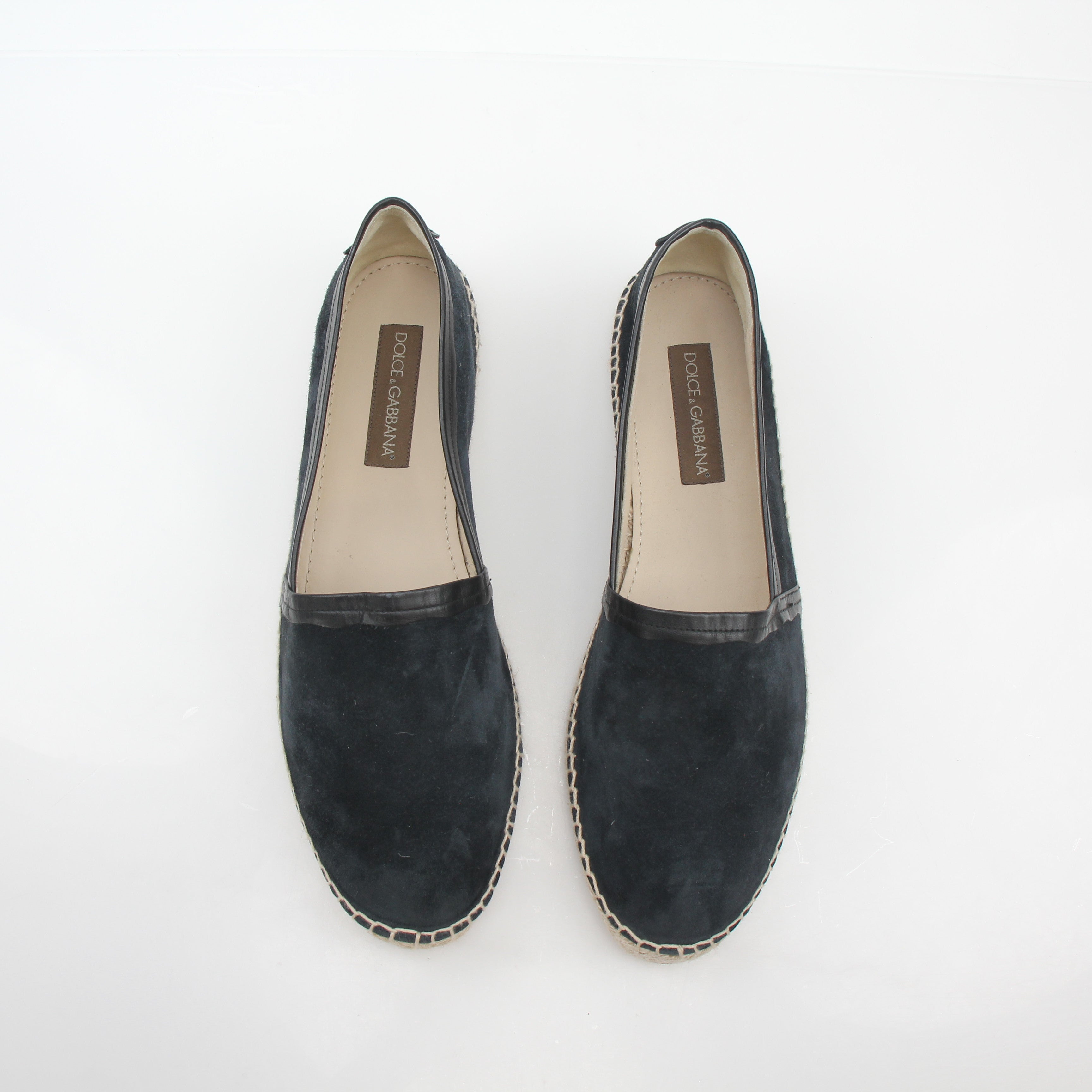 Black suede Dolce & Gabbana espadrille shoes with woven jute soles, displayed on a neutral background.