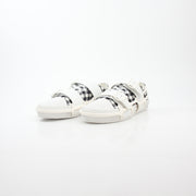Gold & Beyond Burberry black and white gingham Webb low-top sneakers with white rubber soles and lace-up front.