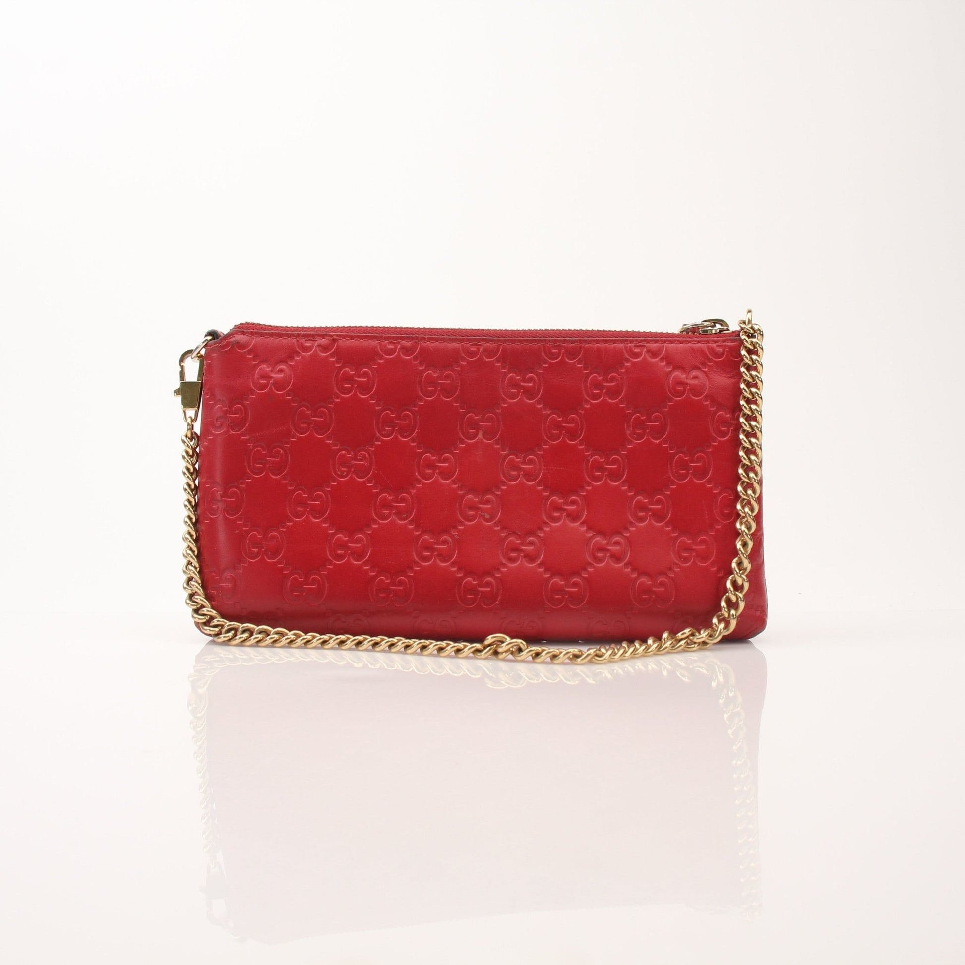 Gold & Beyond Gucci Guccissima leather chain shoulder handbag with signature pattern and gold-tone hardware.