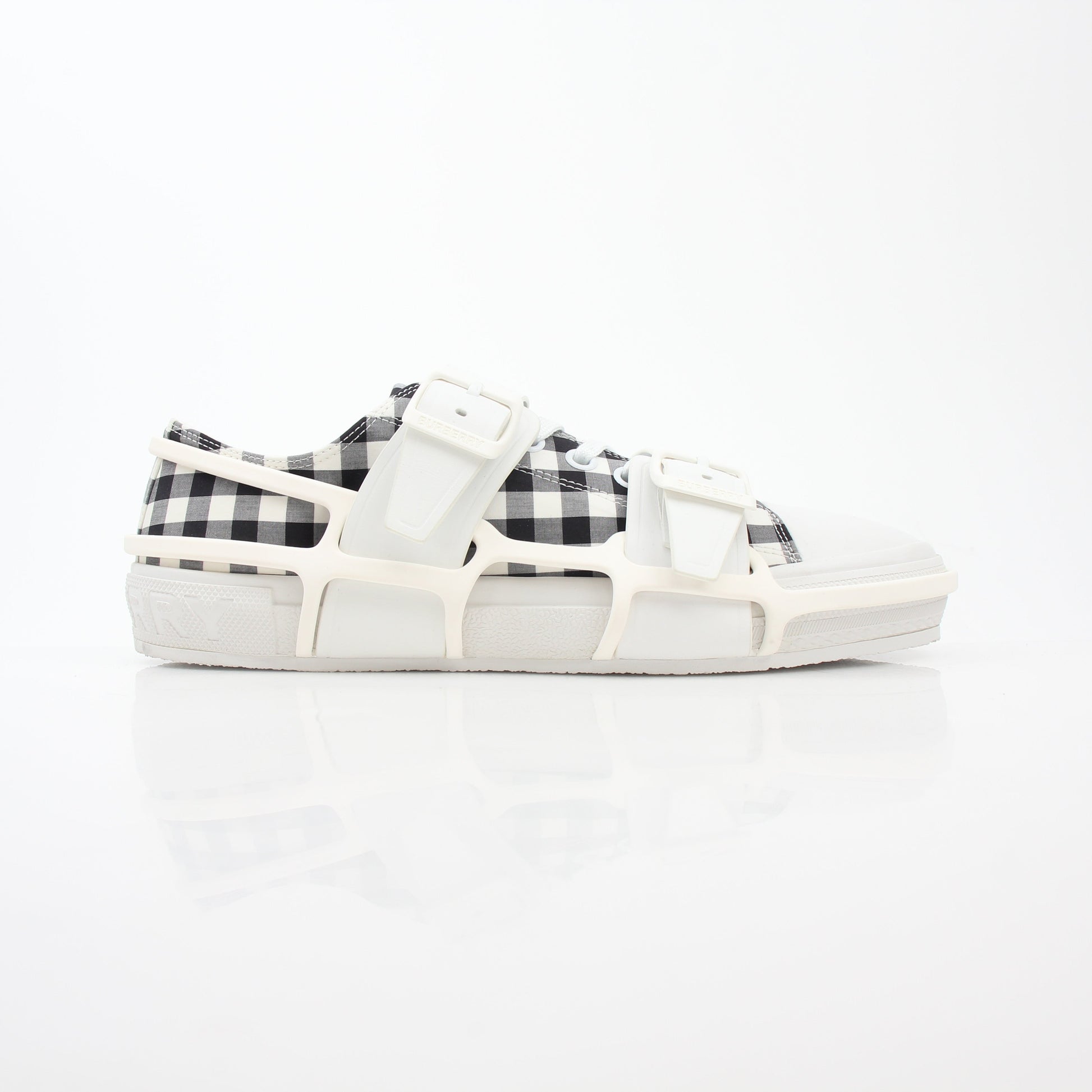 Gold & Beyond Burberry black and white gingham Webb low-top sneakers showing classic pattern and stylish shoe design.