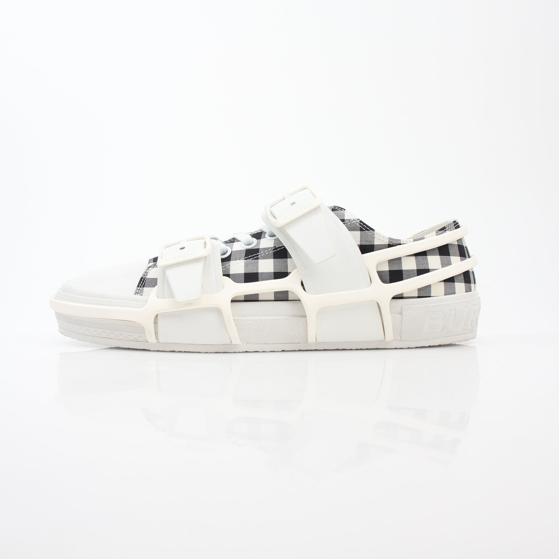 Gold & Beyond Burberry black and white gingham Webb low-top sneakers with lace-up design and rubber sole.