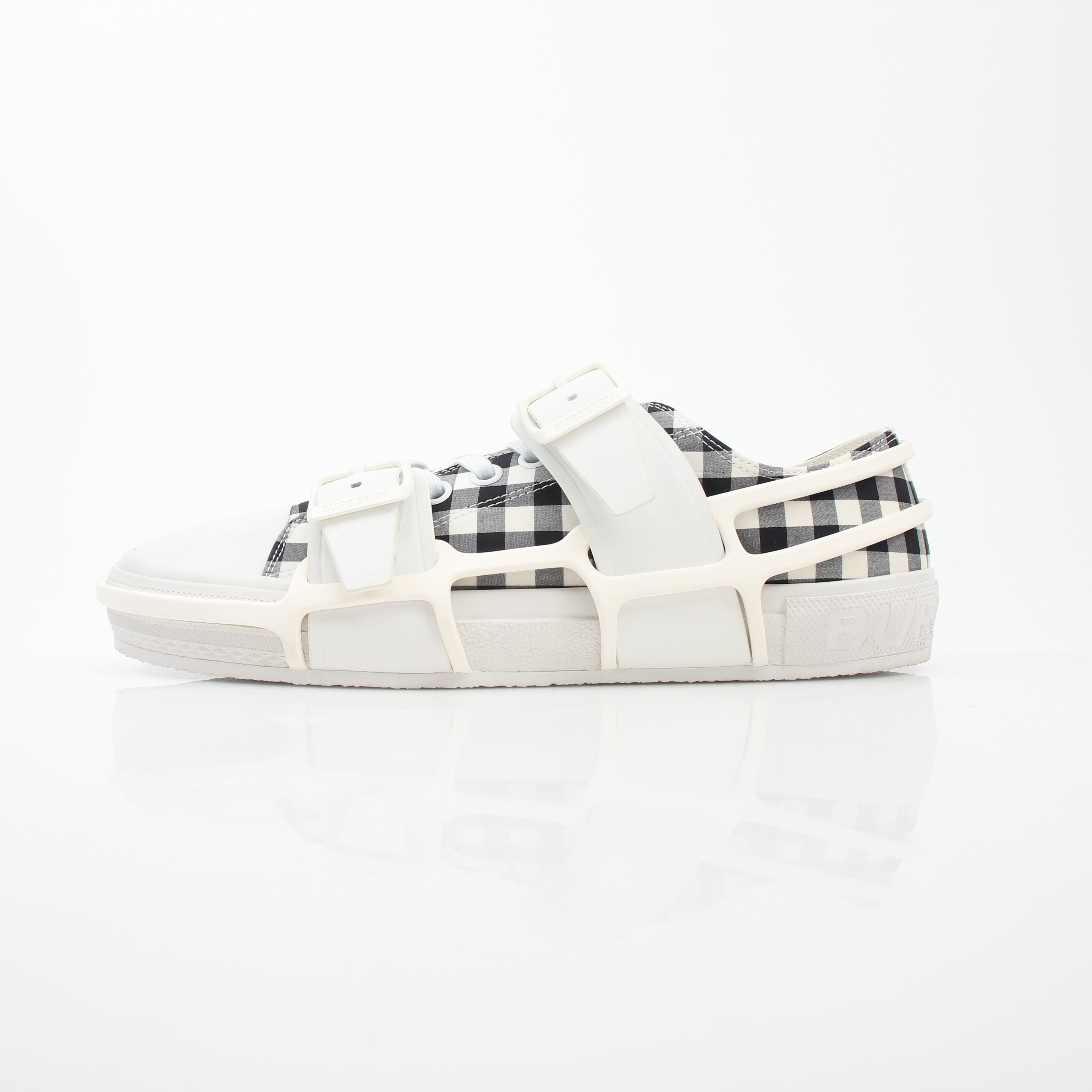 Gold & Beyond Burberry black and white gingham Webb low-top sneakers with lace-up design and rubber sole.