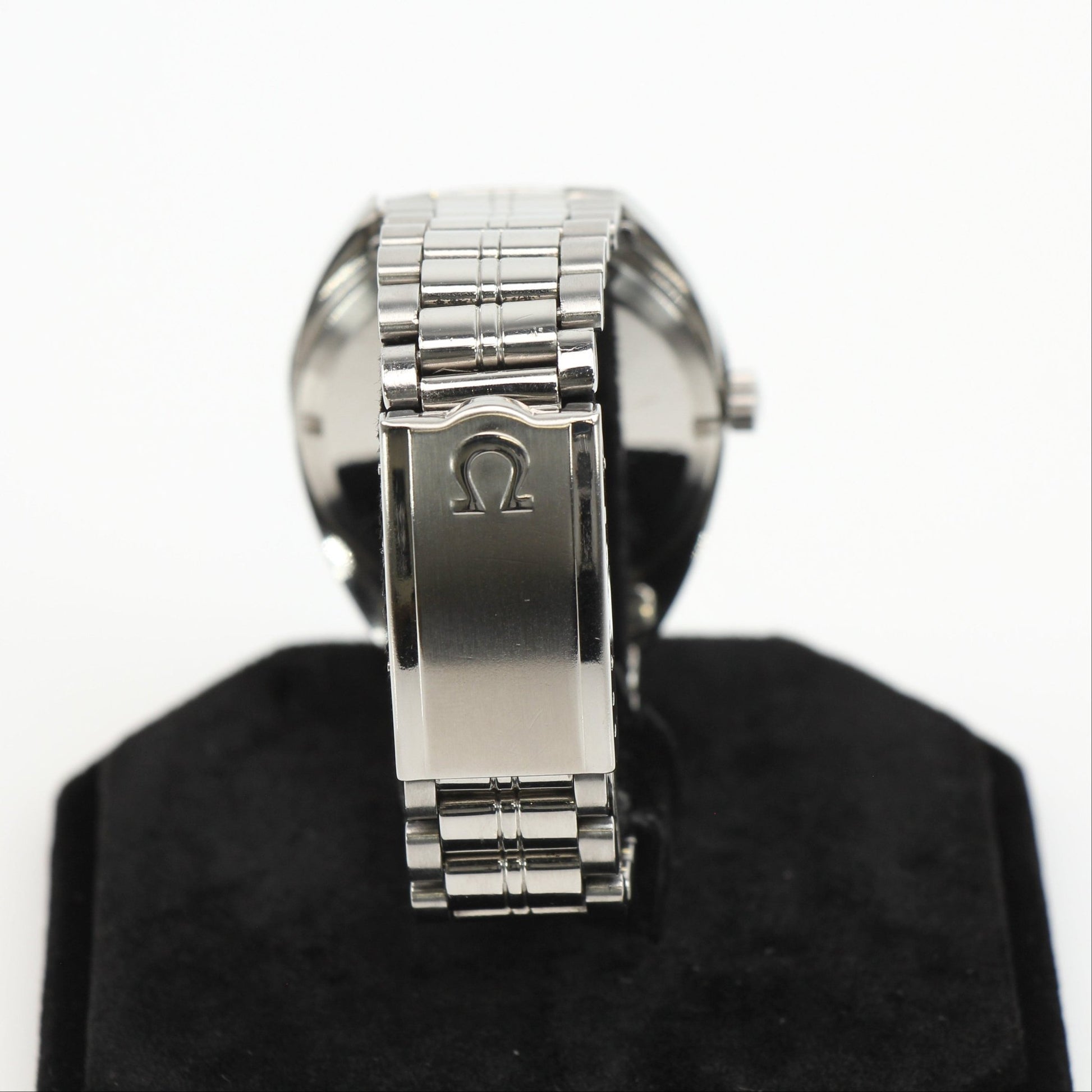 Vintage Omega Seamaster 120 diver's watch with black dial, stainless steel case, and rotating bezel, by Gold & Beyond.