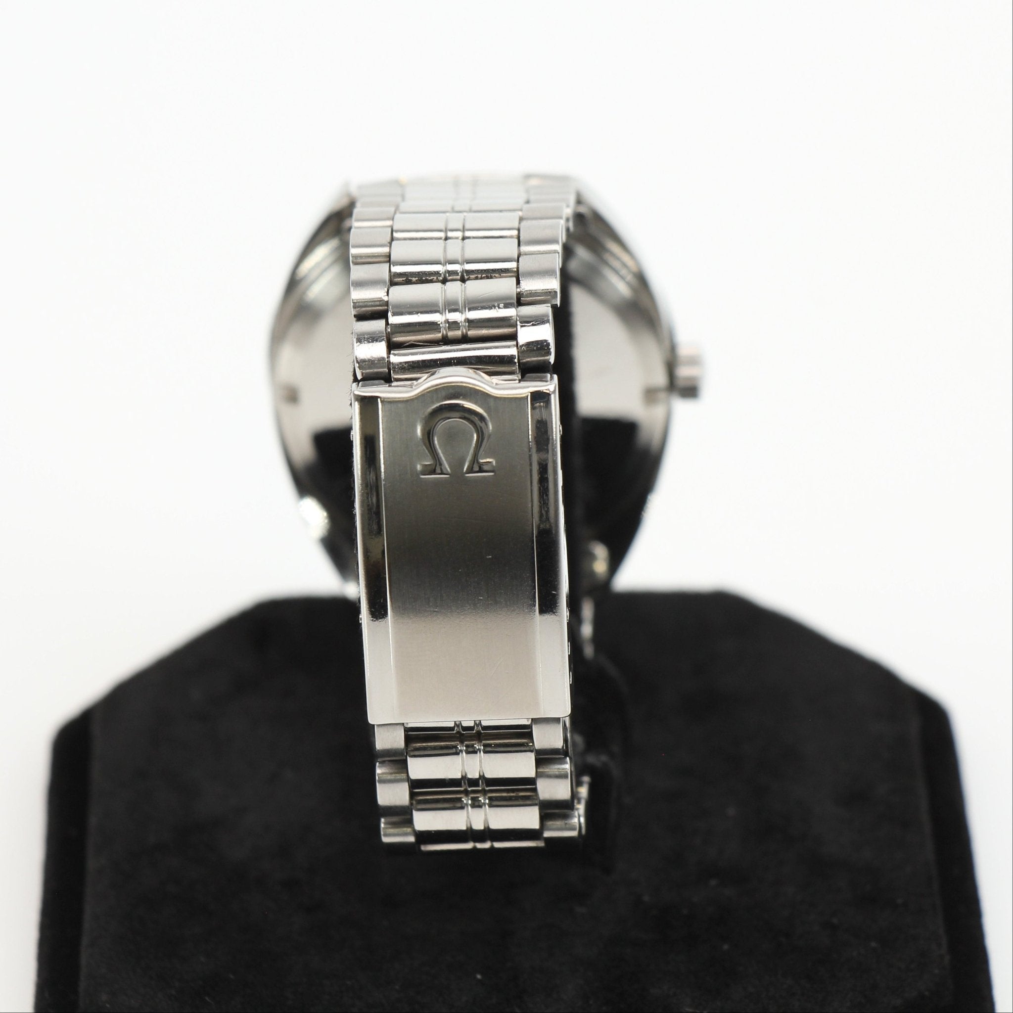 Vintage Omega Seamaster 120 diver's watch with black dial, stainless steel case, and rotating bezel, by Gold & Beyond.