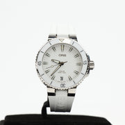 Oris Aquis Date White Diver Watch with stainless steel band and blue bezel showing time and date display.