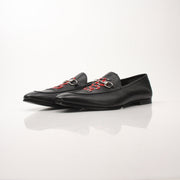 Gold & Beyond men's Gucci King Snake loafers showing detailed snake-print leather shoes with classic loafer design.