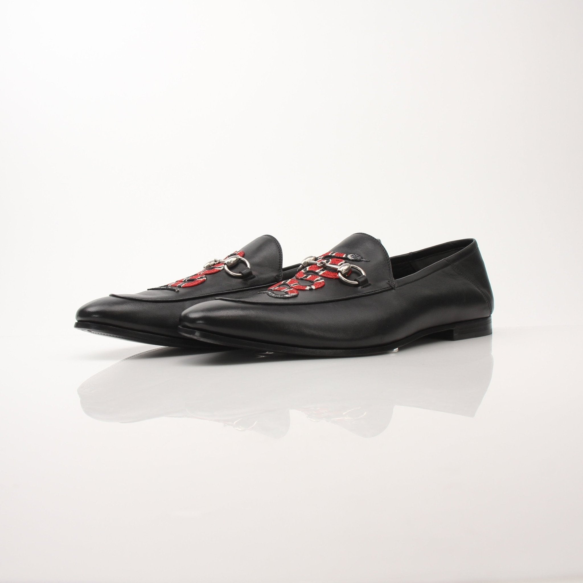 Gold & Beyond men's Gucci King Snake loafers showing detailed snake-print leather shoes with classic loafer design.
