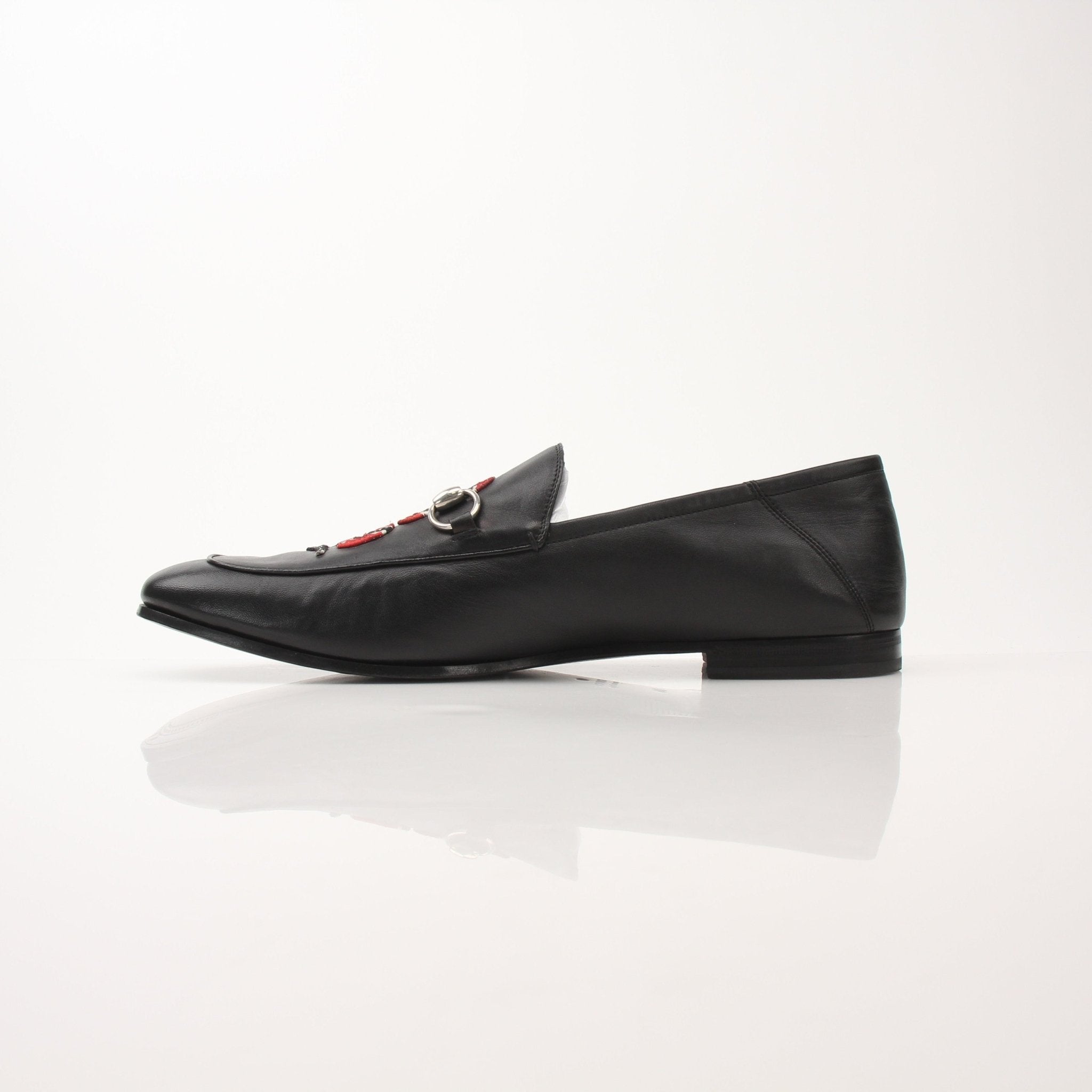 Gold & Beyond Gucci men's King Snake loafers, stylish leather shoes with snake print detailing and slip-on design.