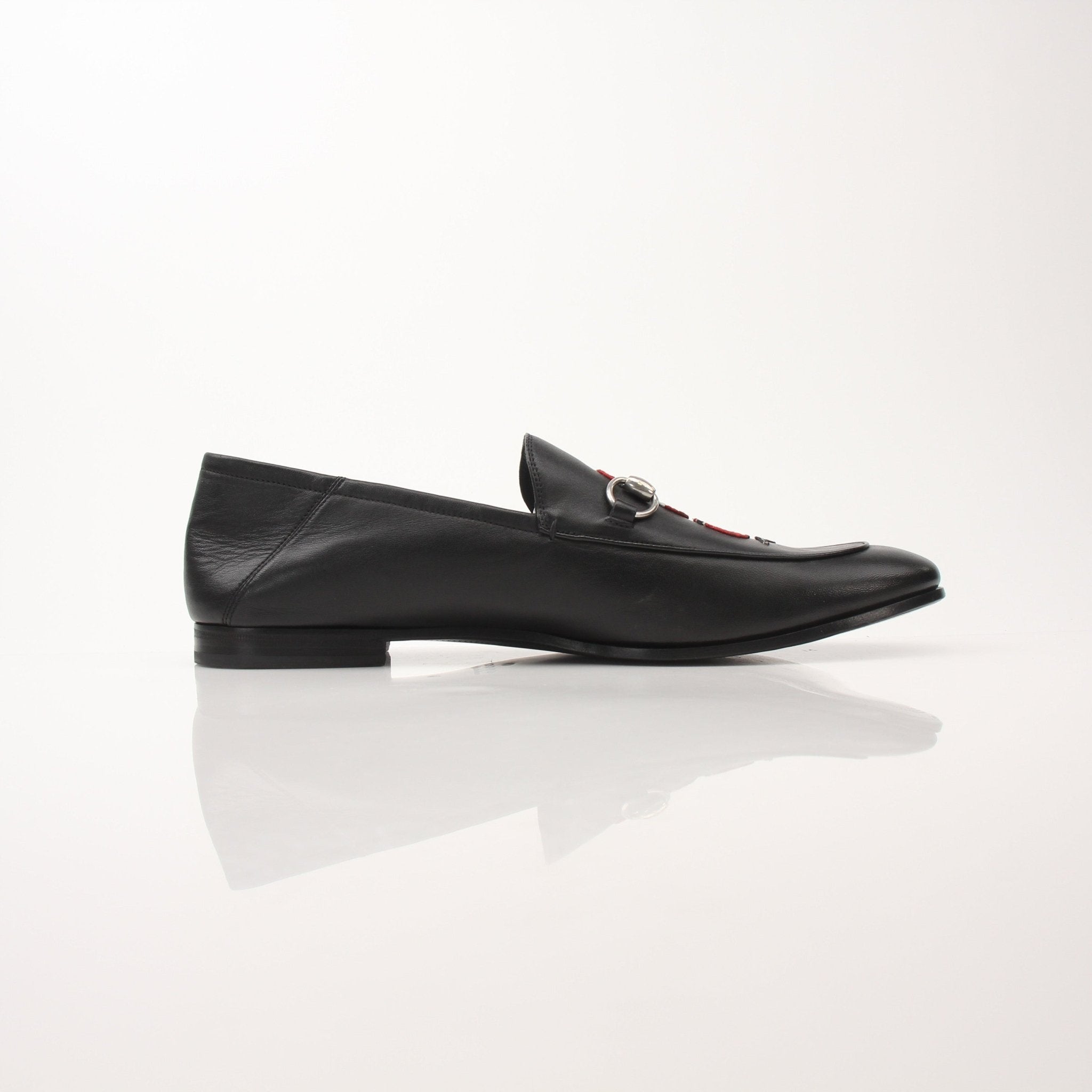 Gold & Beyond Gucci men's King Snake loafers, stylish shoes featuring snake-inspired design and sleek leather construction.