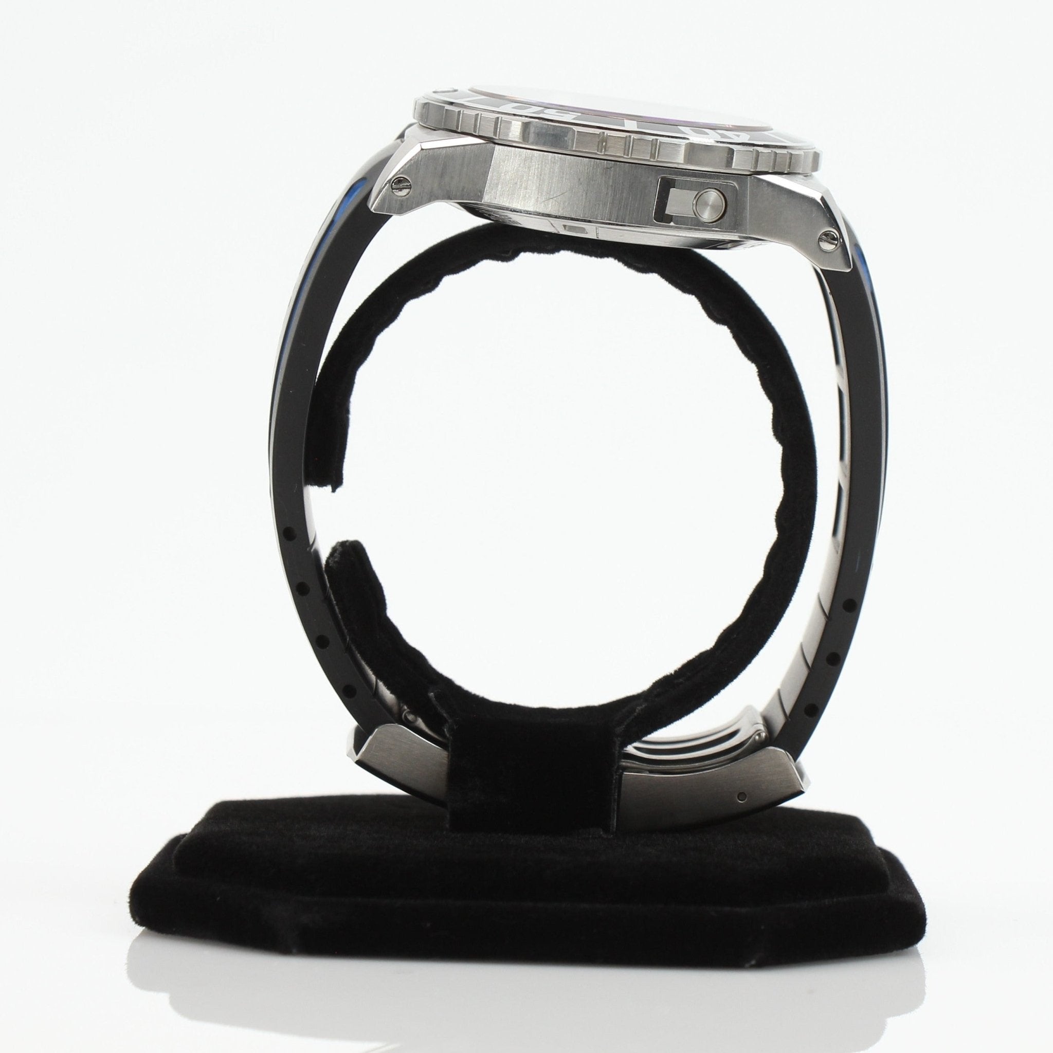 Carl F. Bucherer ScubaTec diver watch with black dial, stainless steel bracelet, and rotating bezel displayed in the image.