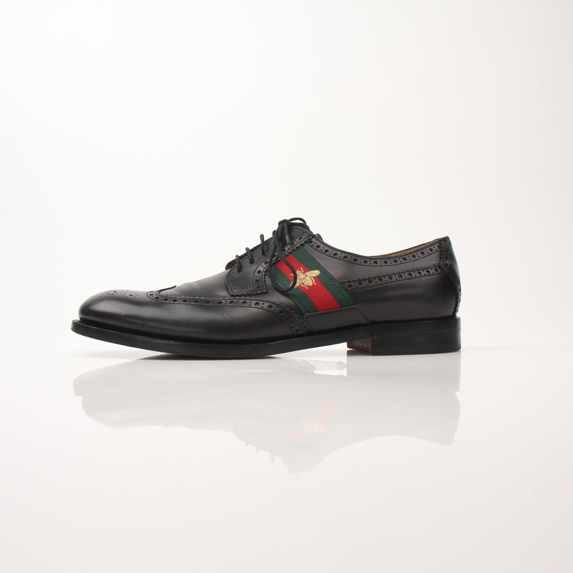 Gold & Beyond Gucci men's Bee Web Derby shoes featuring classic leather design with bee and web pattern details.
