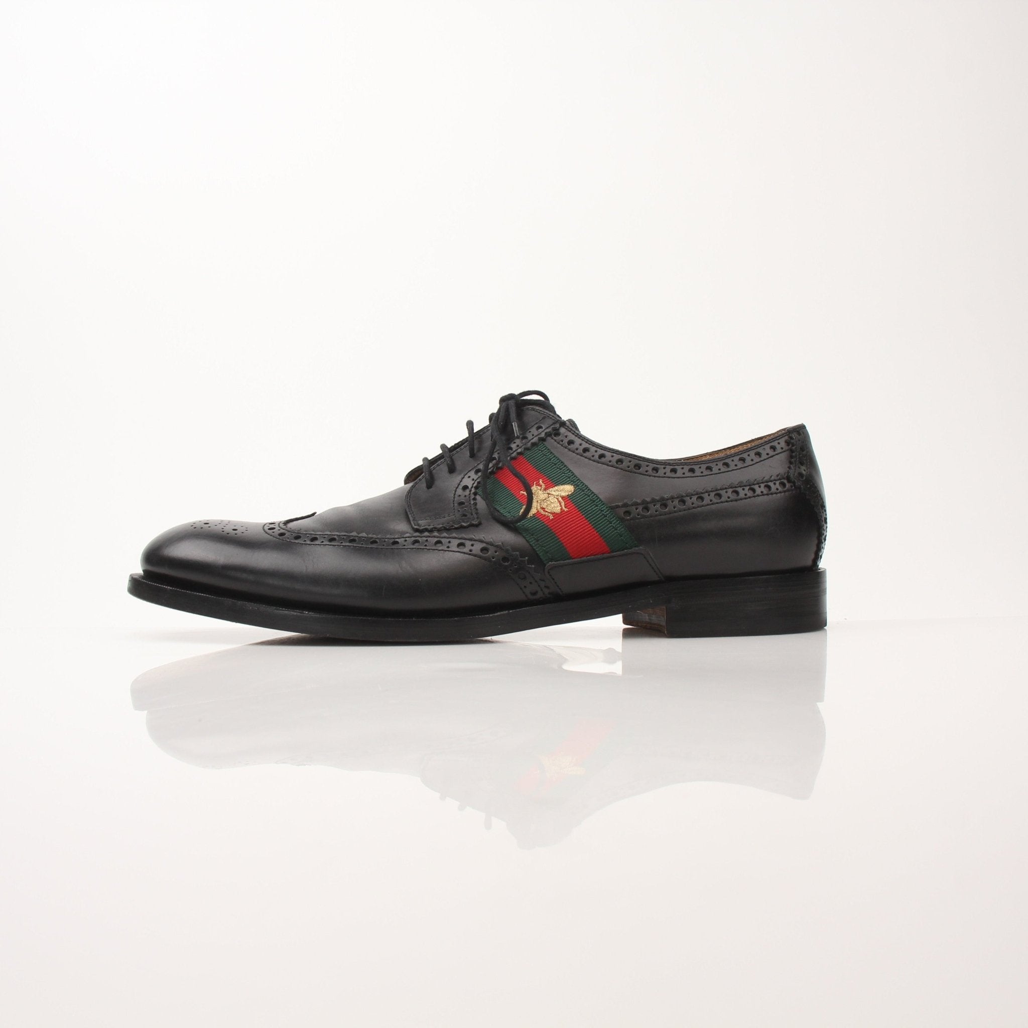 Gold & Beyond Gucci men's Bee Web Derby shoes featuring classic leather design with bee and web pattern details.