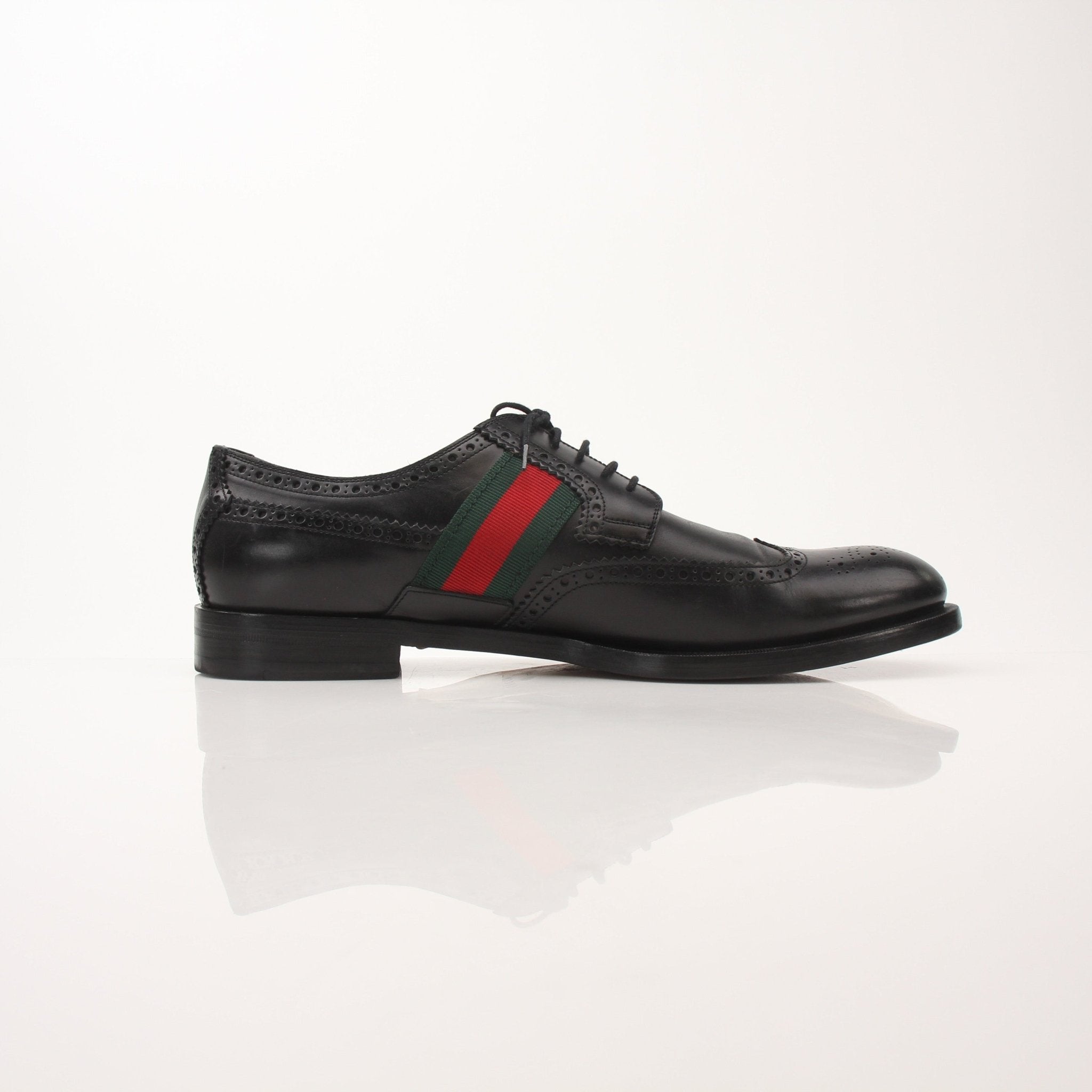 Gold & Beyond Gucci Men’s Bee Web Derby Shoes showing classic leather shoes with bee and web pattern details.