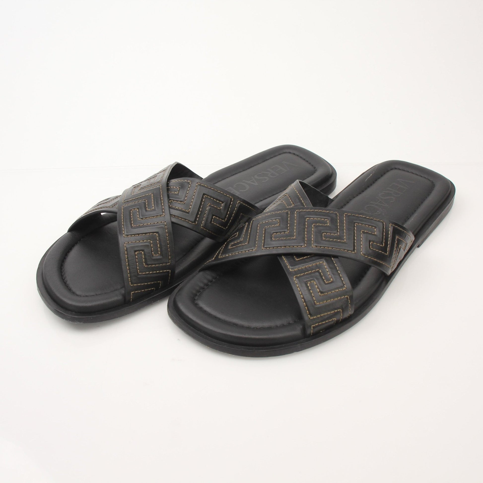 Gold & Beyond Versace men's Greca sandals, stylish open-toe shoes with signature Greek key pattern and luxurious design.