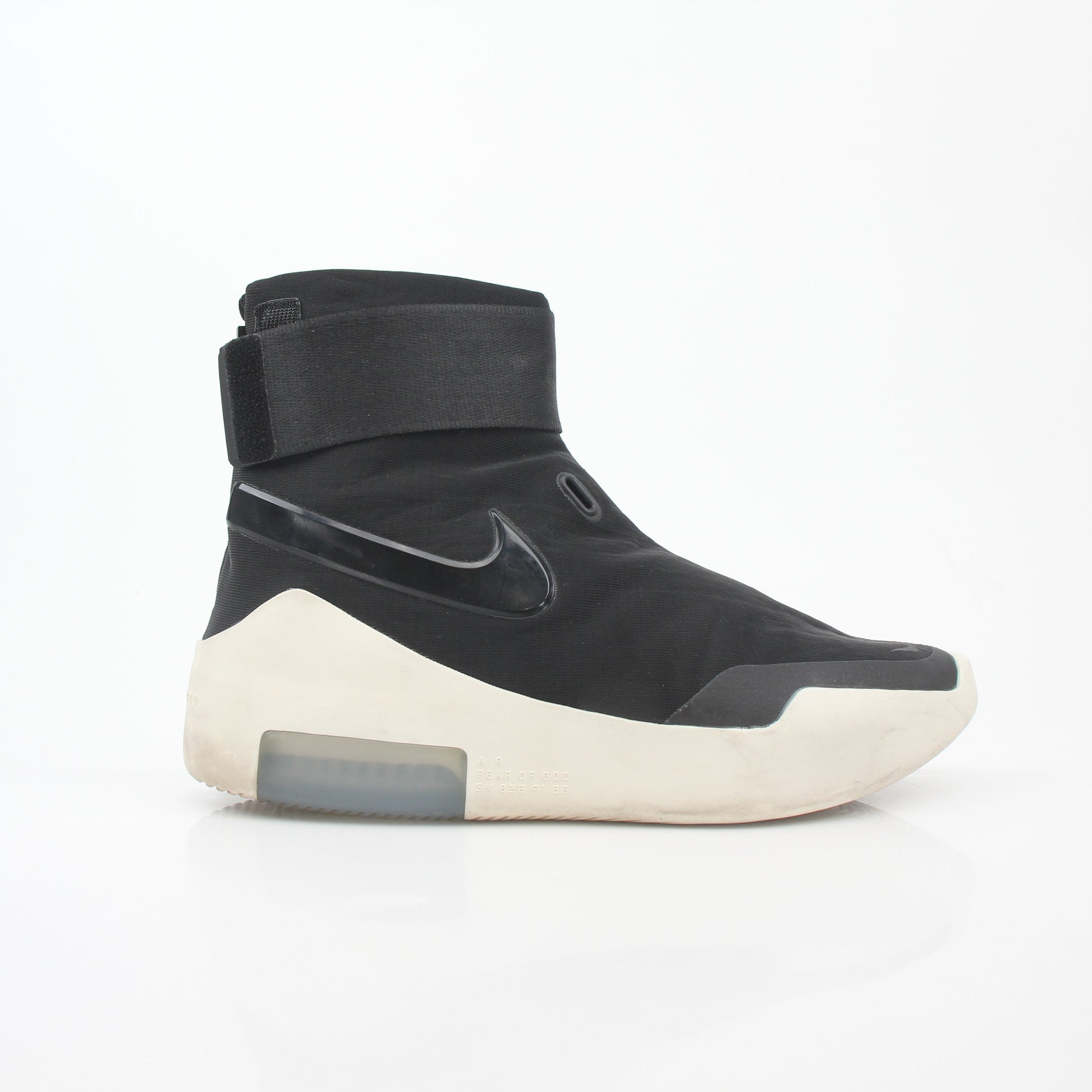 Black Nike x Fear of God Air Fear of God 1 high-top sneakers with Nike branding and sleek design, styled on a plain background.