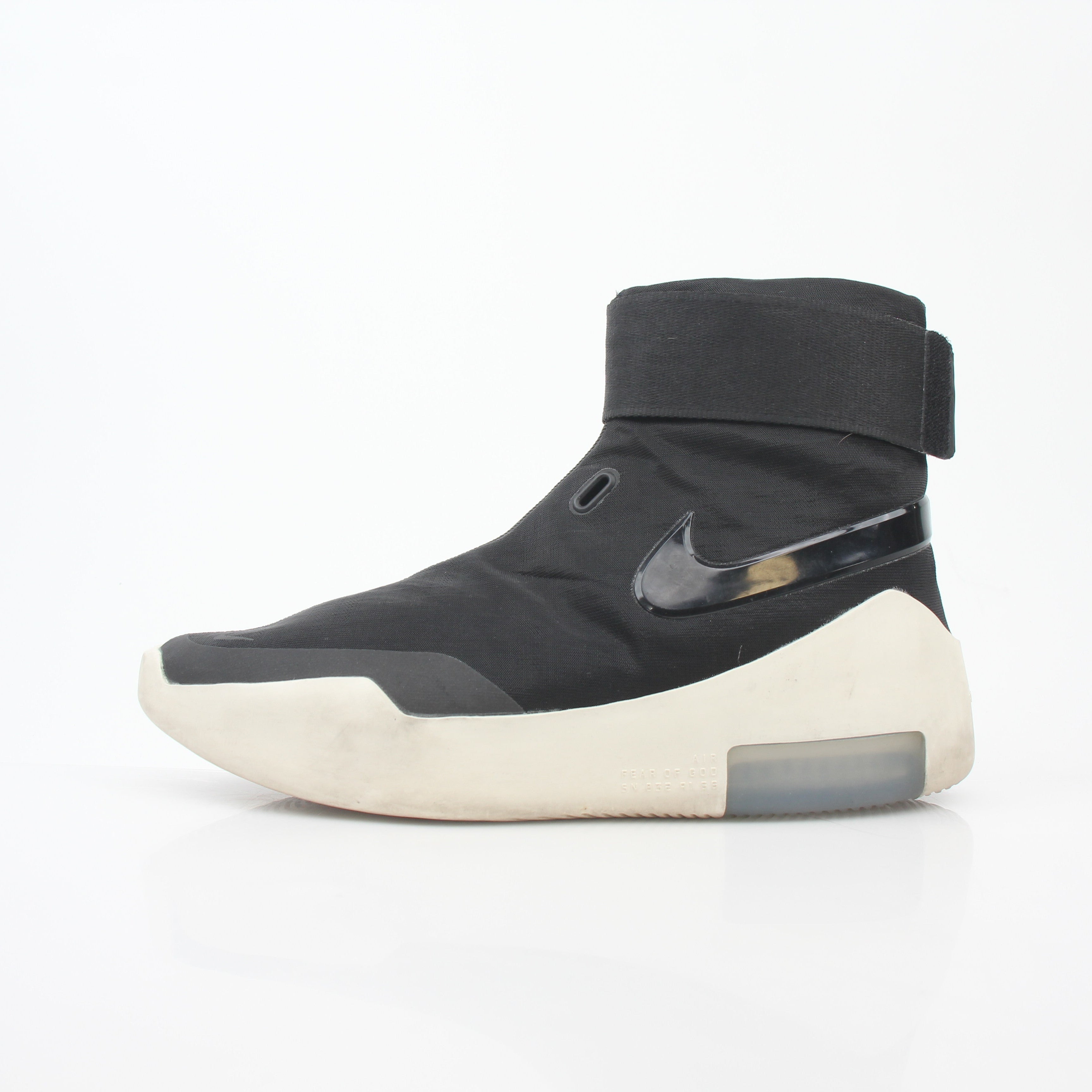Black Nike x Fear of God Air Fear of God 1 high-top sneakers styled for men, showcasing sleek design and premium materials.