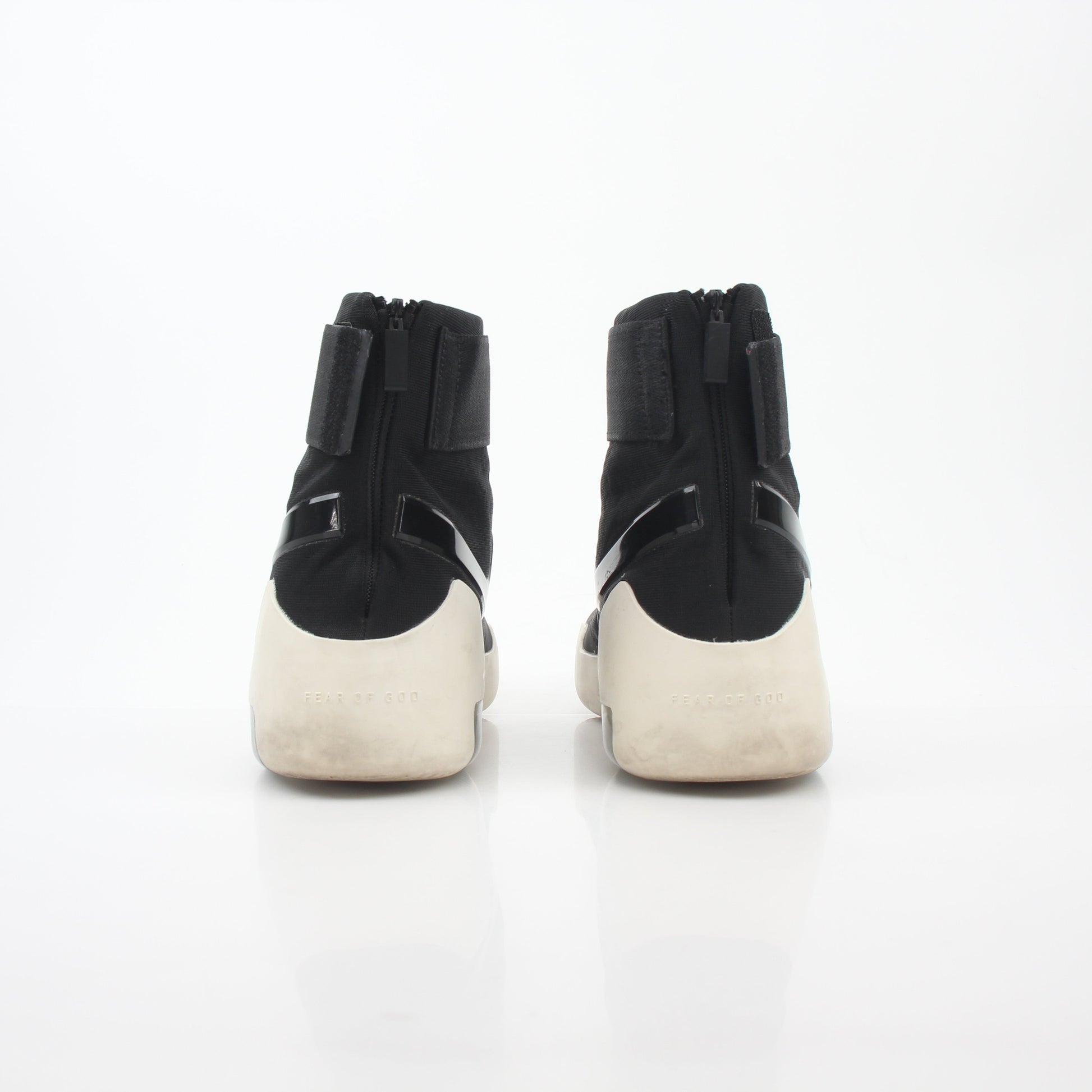 Nike x Fear of God black Air Fear of God 1 high-top sneakers, showing the sleek design and premium details of the shoes.