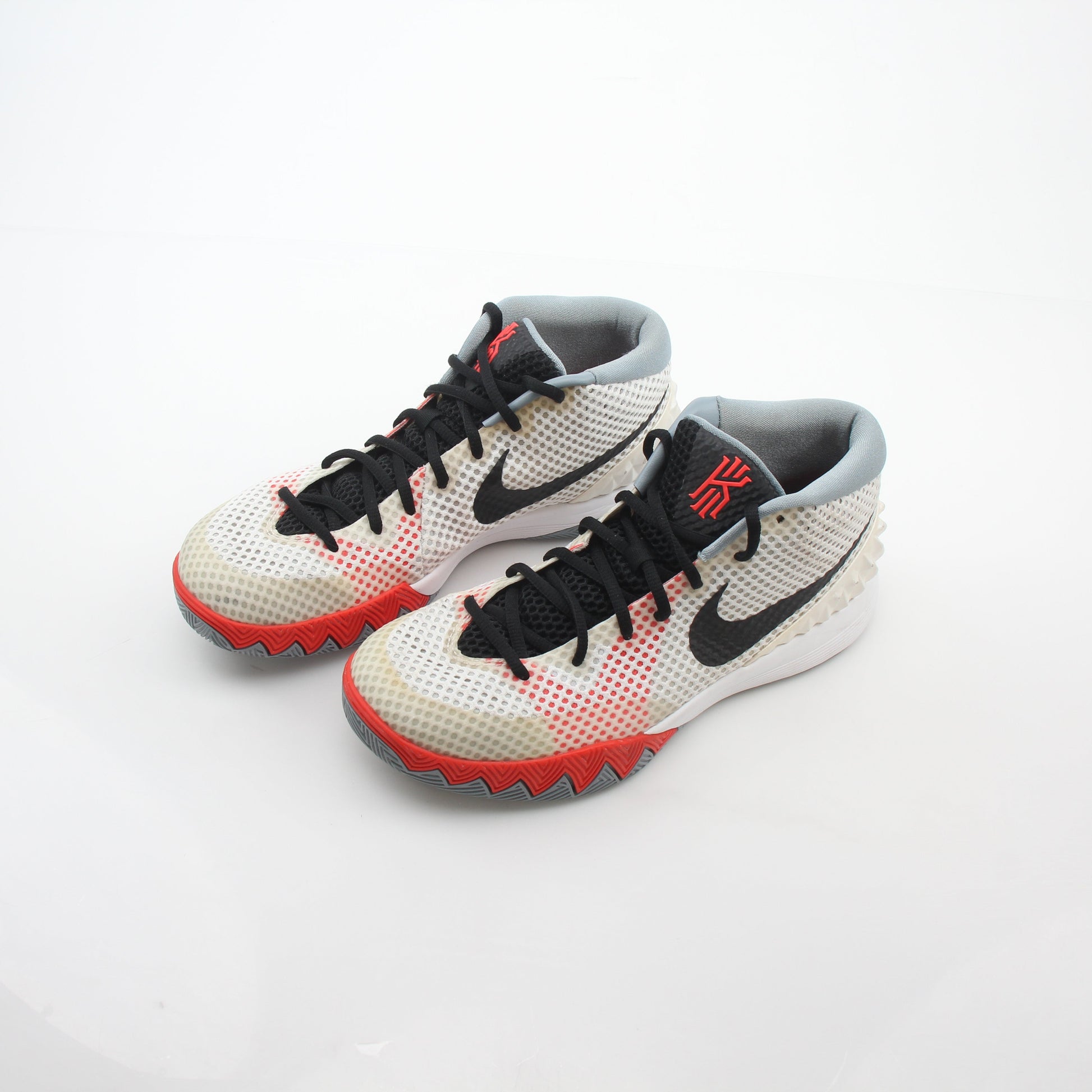 White Nike Kyrie 1 Dream basketball sneakers with gold accents, athletic shoes designed for performance and style.