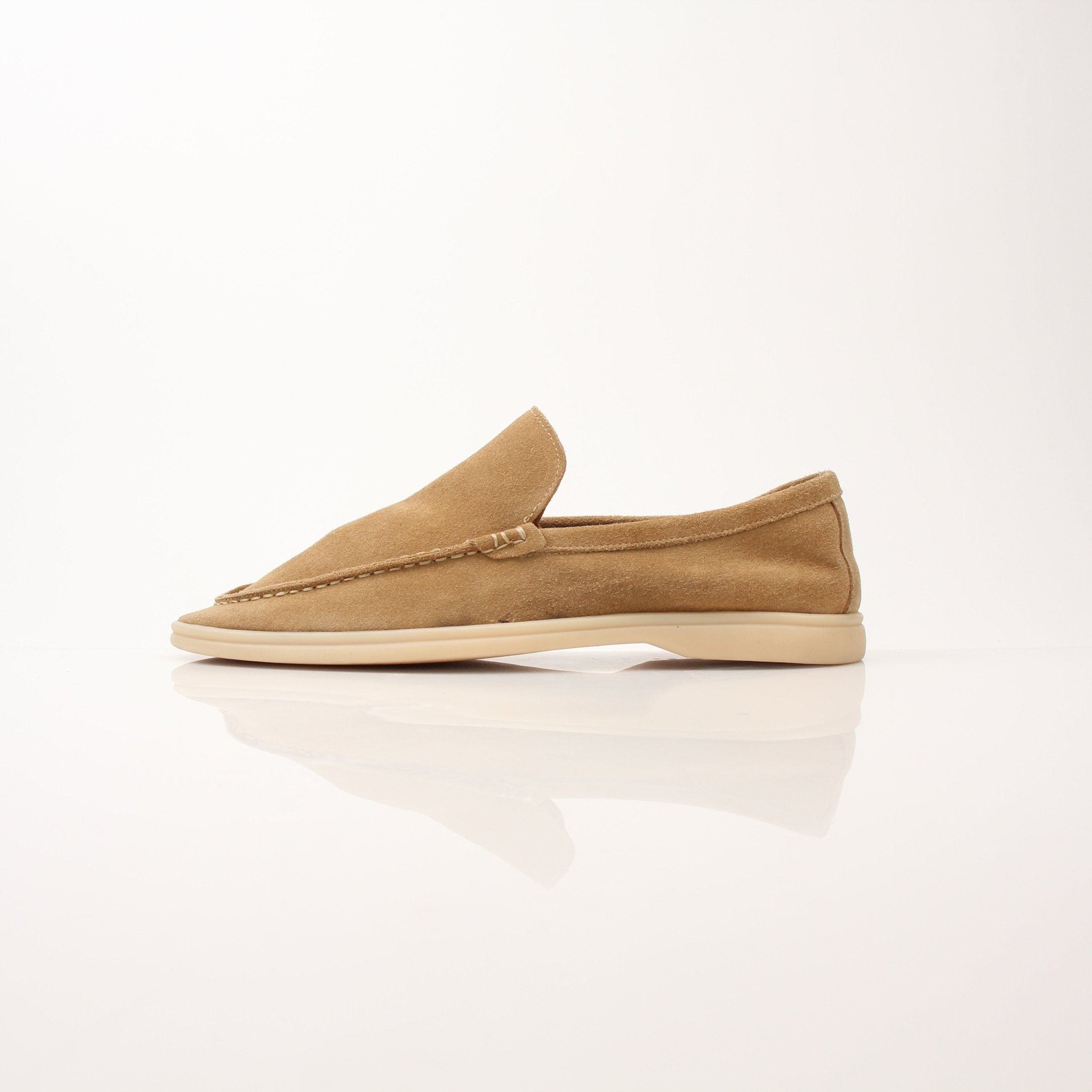 Loro Piana men's summer walk loafers in light-colored leather, stylish slip-on shoes by Gold & Beyond.
