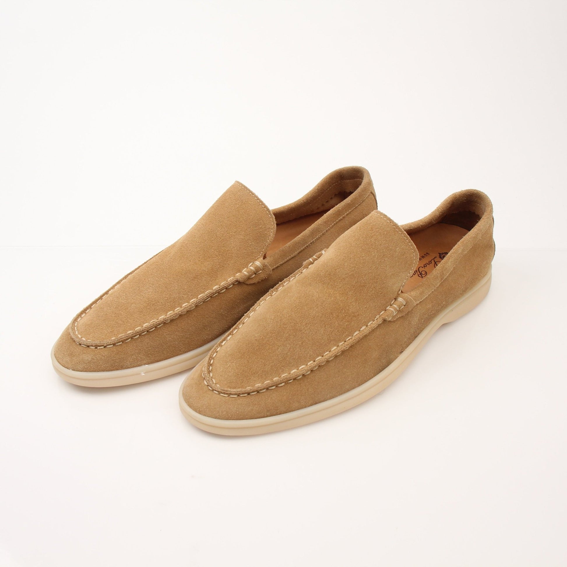 Loro Piana men's summer walk loafers in light-colored leather, stylish slip-on shoes from Gold & Beyond.