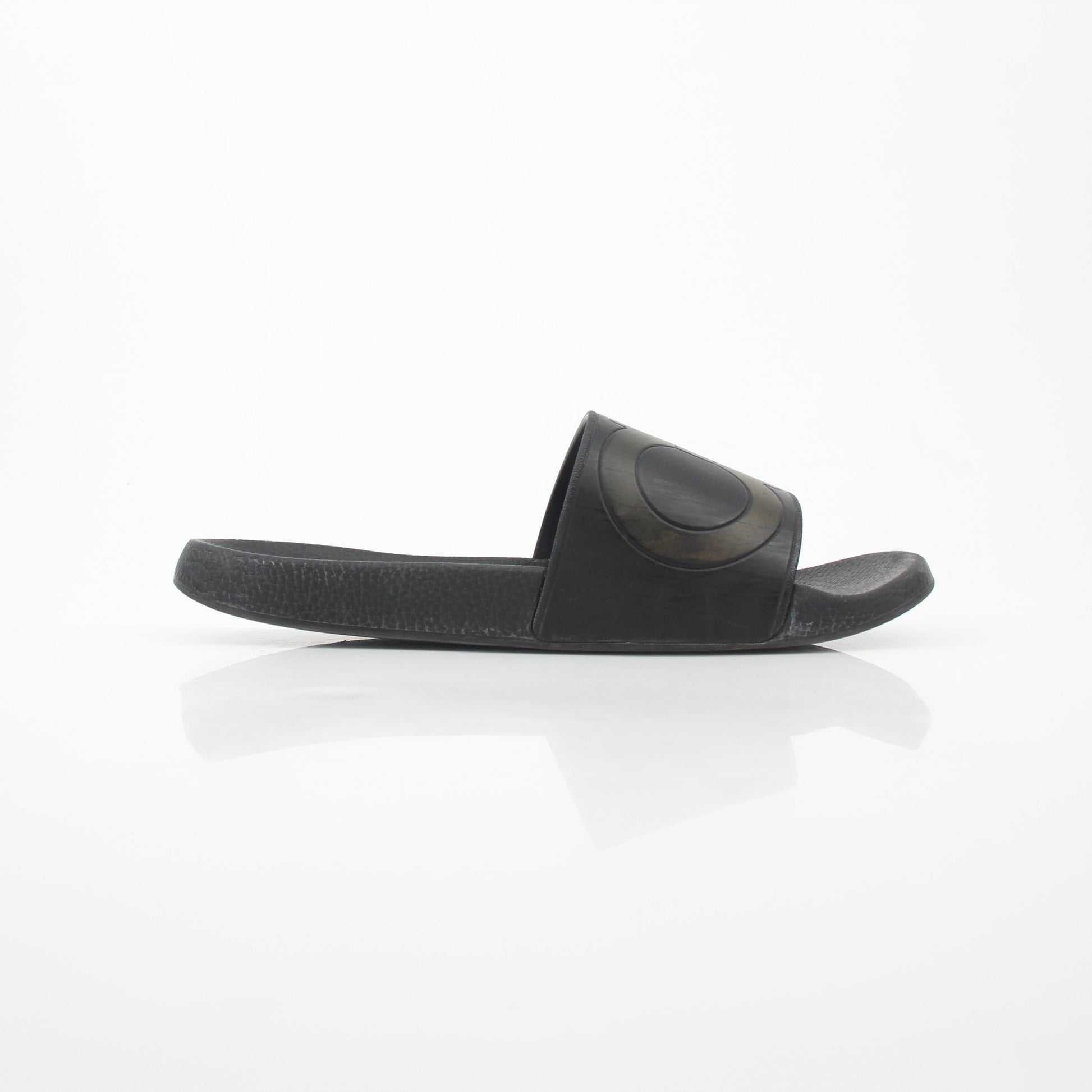 Black Salvatore Ferragamo Groove 2 Gancini slide sandals with gold accents, featuring sleek leather straps and a comfortable sole.