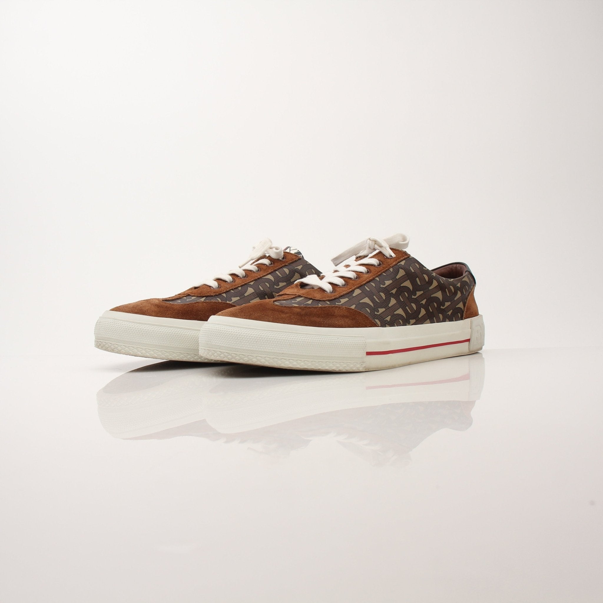 Gold & Beyond men's Burberry Nelson TB Monogram sneakers with signature monogram pattern and stylish design.