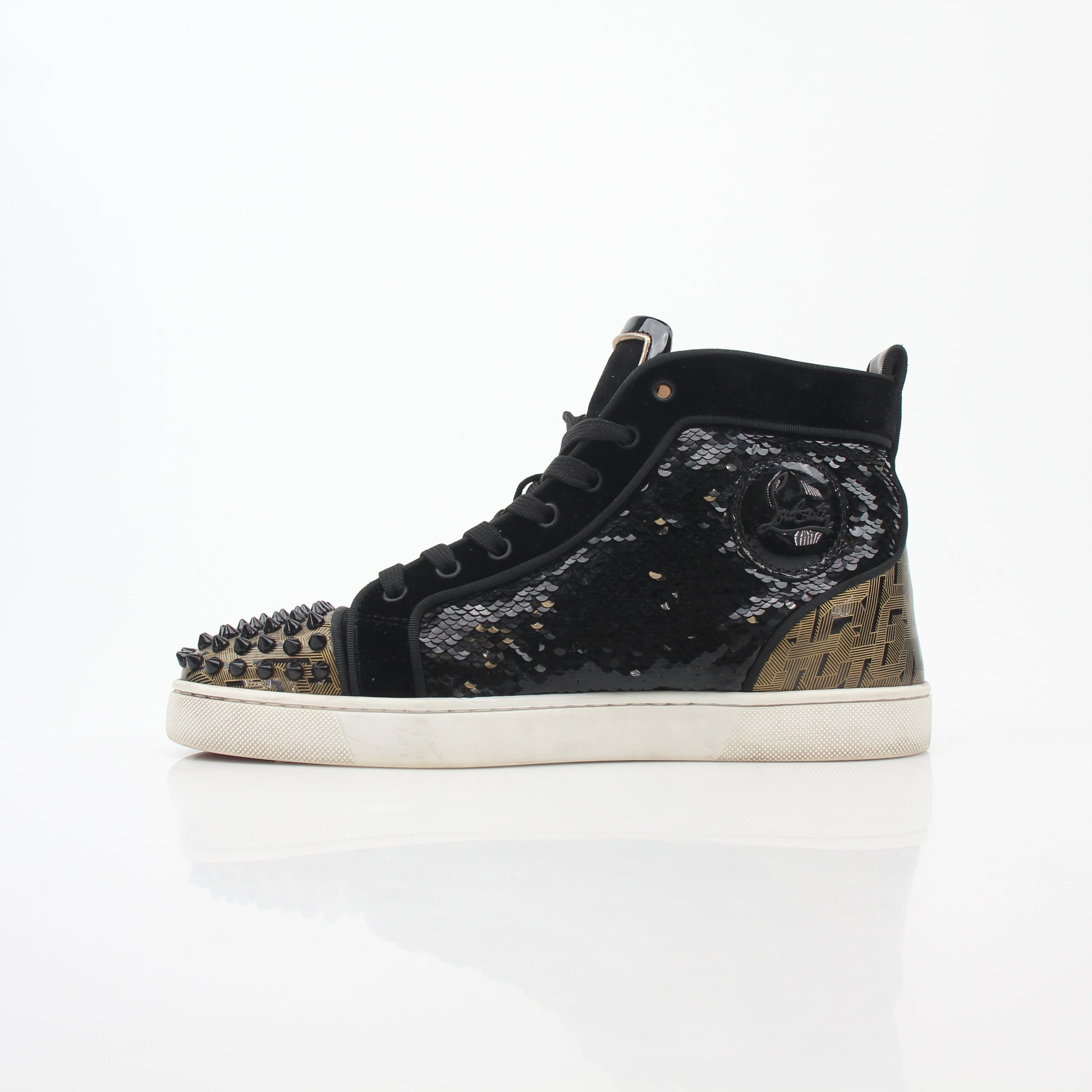 Christian Louboutin Black Lou Spikes Orlato high-top sneakers with studded design and signature red soles, showcasing stylish footwear.