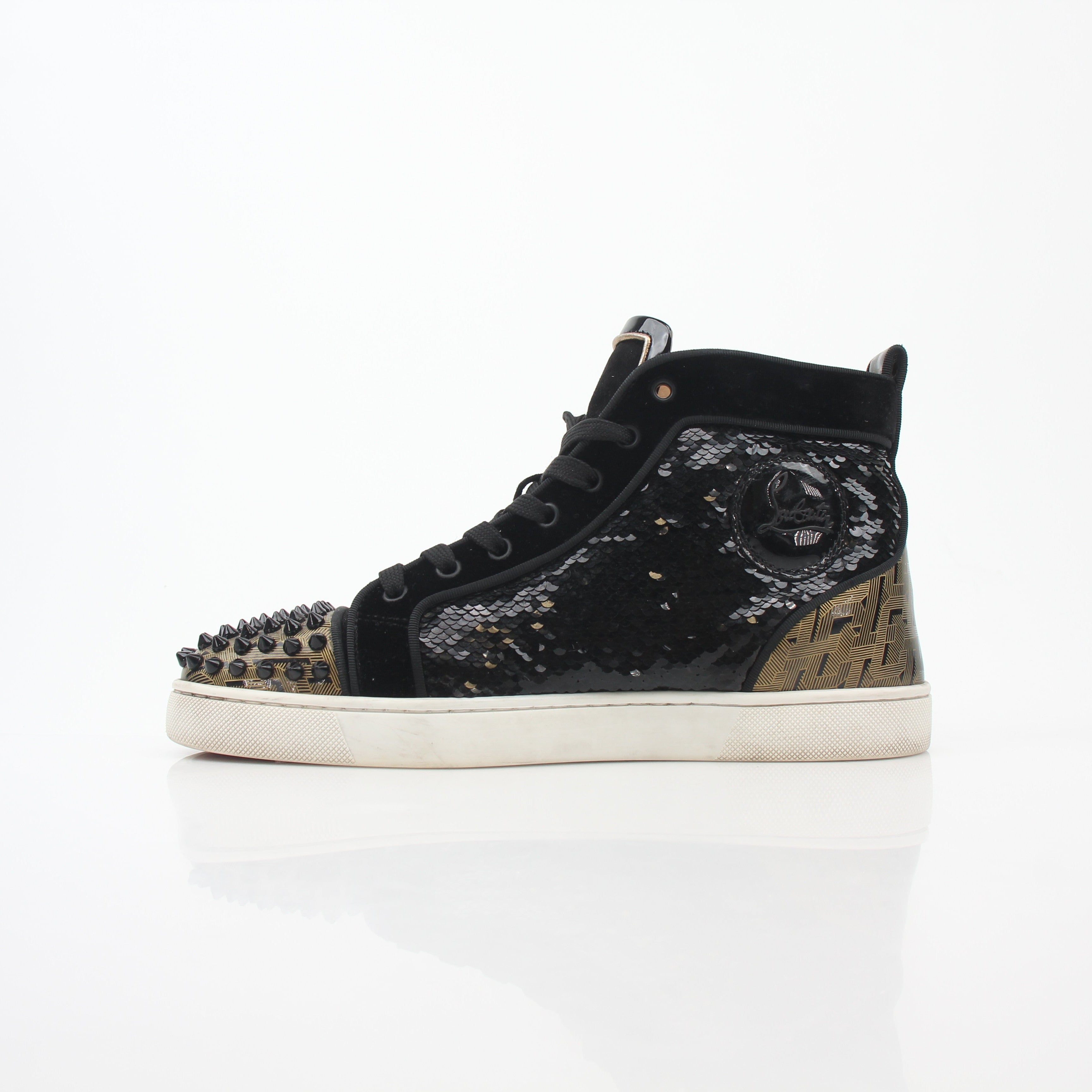Christian Louboutin Black Lou Spikes Orlato high-top sneakers with studded design and signature red soles, showcasing stylish footwear.