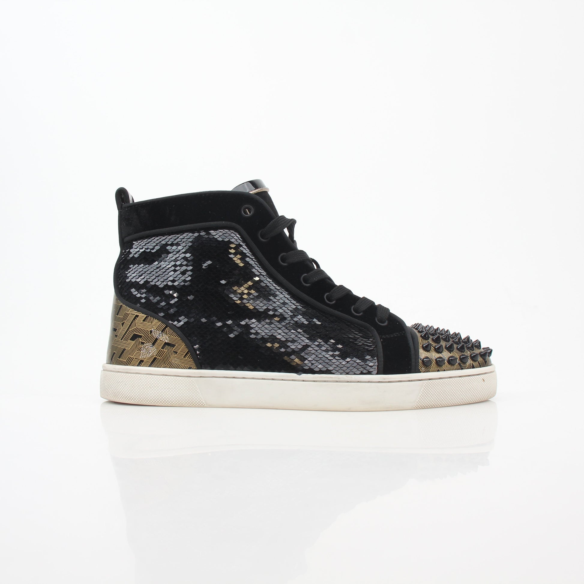 Black Christian Louboutin Lou Spikes Orlato high-top sneakers with spikes, black laces, and signature red soles, displayed on a white background.