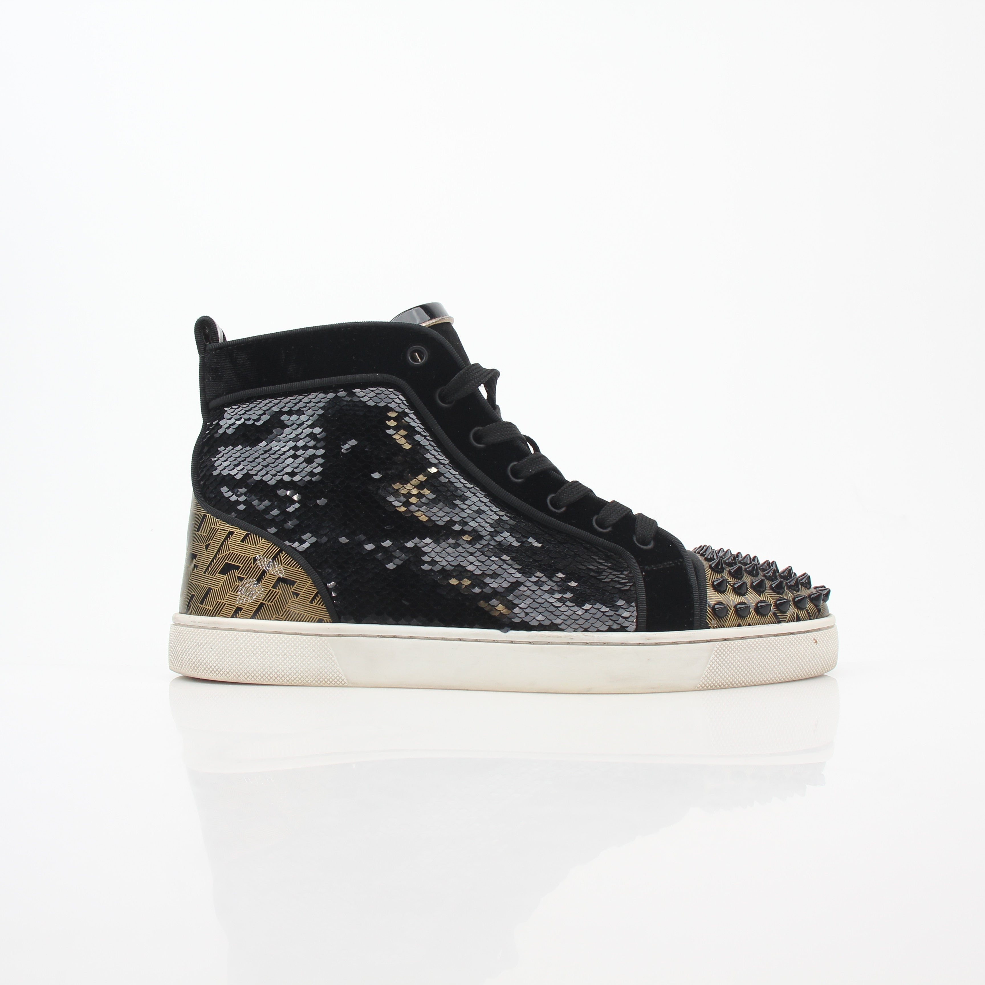 Black Christian Louboutin Lou Spikes Orlato high-top sneakers with spikes, black laces, and signature red soles, displayed on a white background.