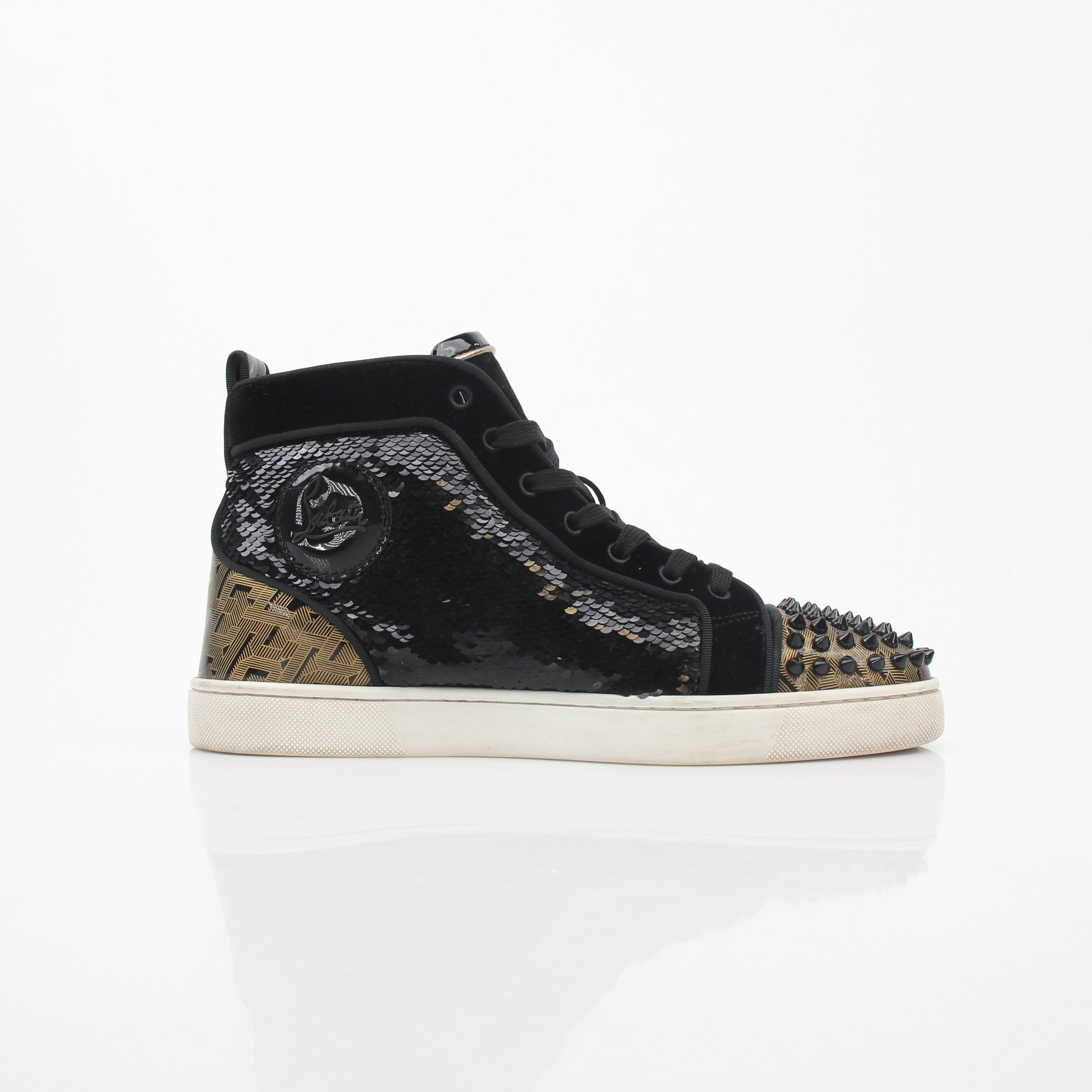 Christian Louboutin Black Lou Spikes Orlato high-top sneakers with spike embellishments and sleek leather design.