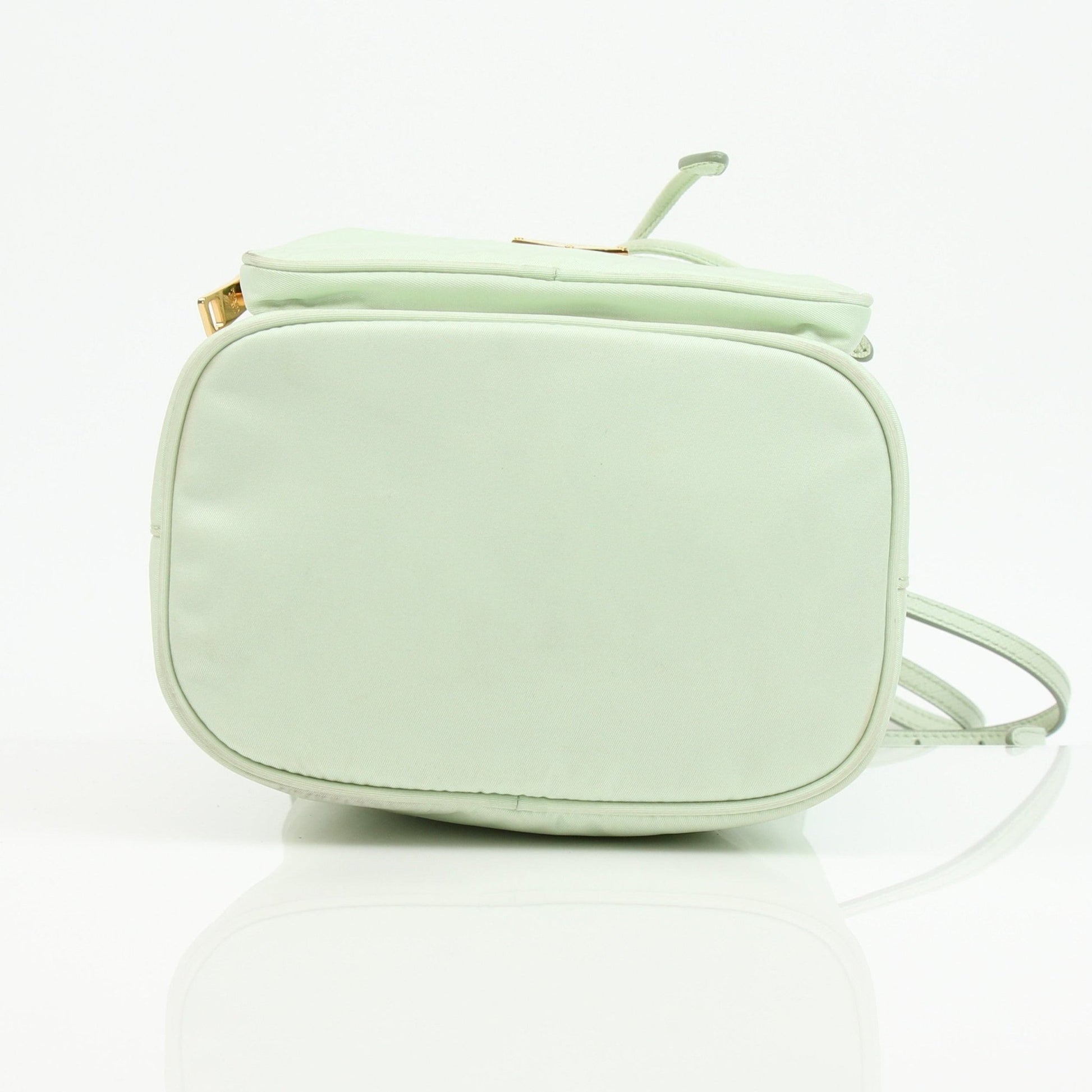 Prada nylon drawstring handbag with adjustable straps and sleek design, featuring the Prada logo on the front.
