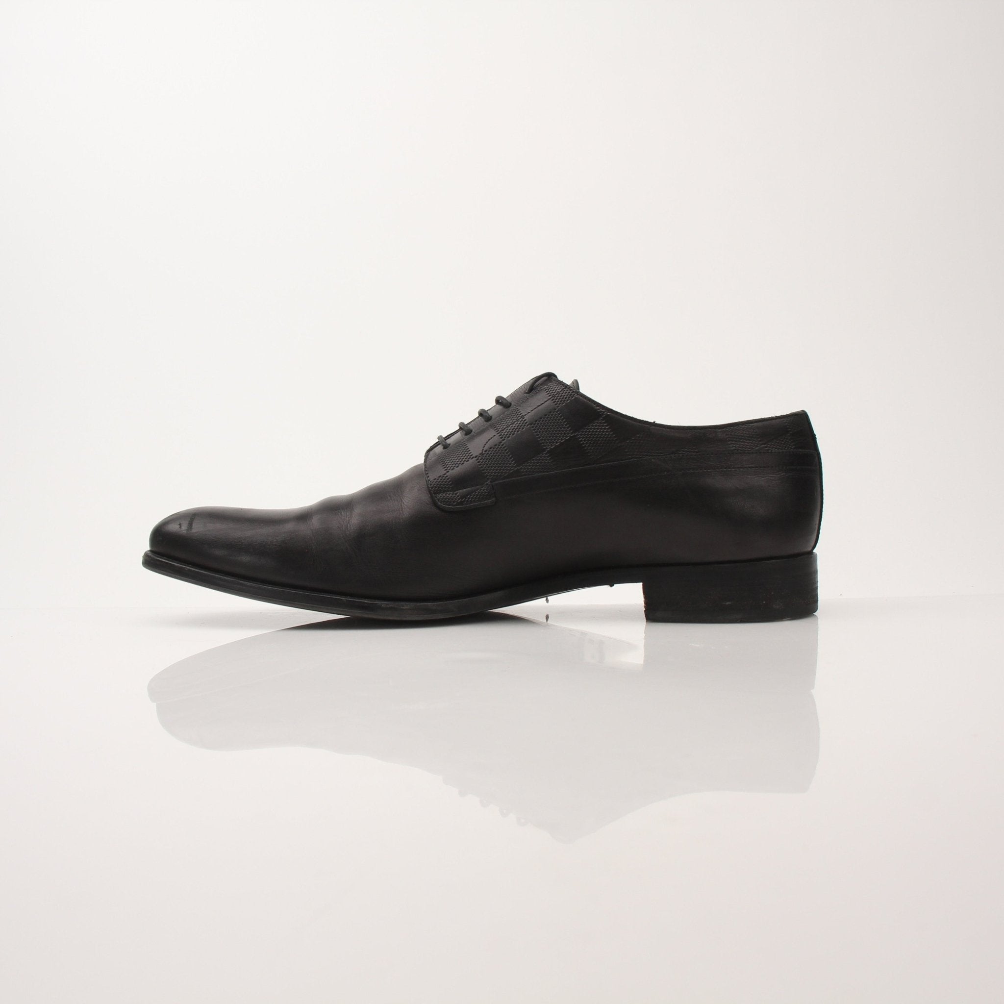 Gold & Beyond Louis Vuitton Men’s Haussmann Derby Shoes showing sleek leather design and classic lace-up style.
